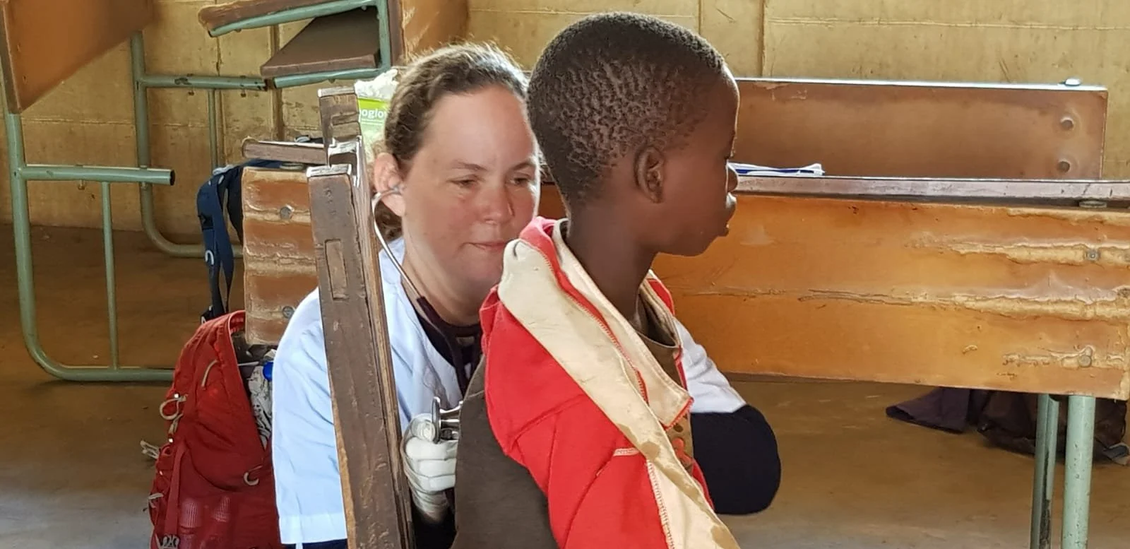 NATAN DOCTOR AND PATIENT AT FIELD CLINIC NEAR BEIRA MOZAMBIQUE FOLLOWING CYCLONE IDAI - 2019