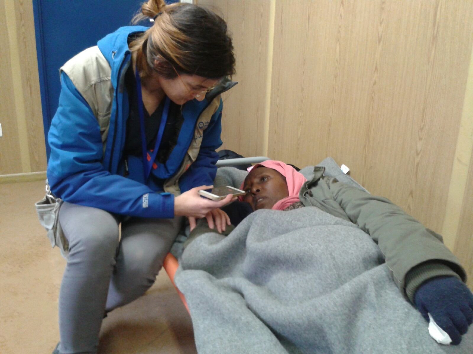 NATAN MD WITH PATIENT - REFUGEE RELIEF OPERATION, PRESEVO, SERBIA 2015