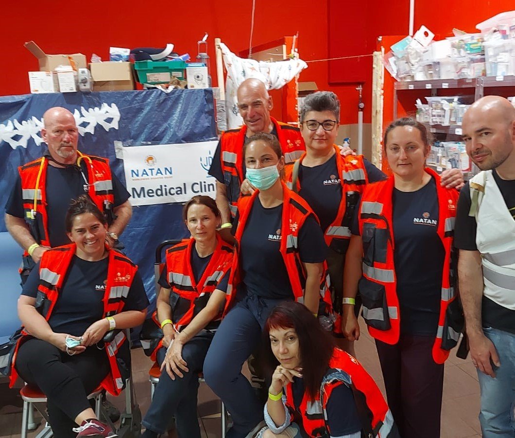 NATAN Team 10 volunteers completed their first full day of work in the medical clinic at Przemysl Refugee Center
Front row: Maayan Garber, Gudrun Seligsohn, Revital Burshtein, Tatiana Gur, Liudmilla Gubariva, far right: Boris, local translator; crou