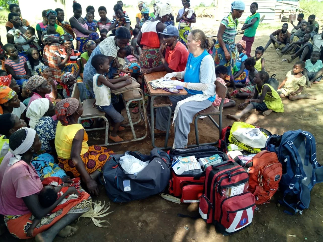 PATIENTS AT OUTDOOR FIELD CLINIC NEAR BEIRA MOZAMBIQUE FOLLOWING CYCLONE IDAI - 2019