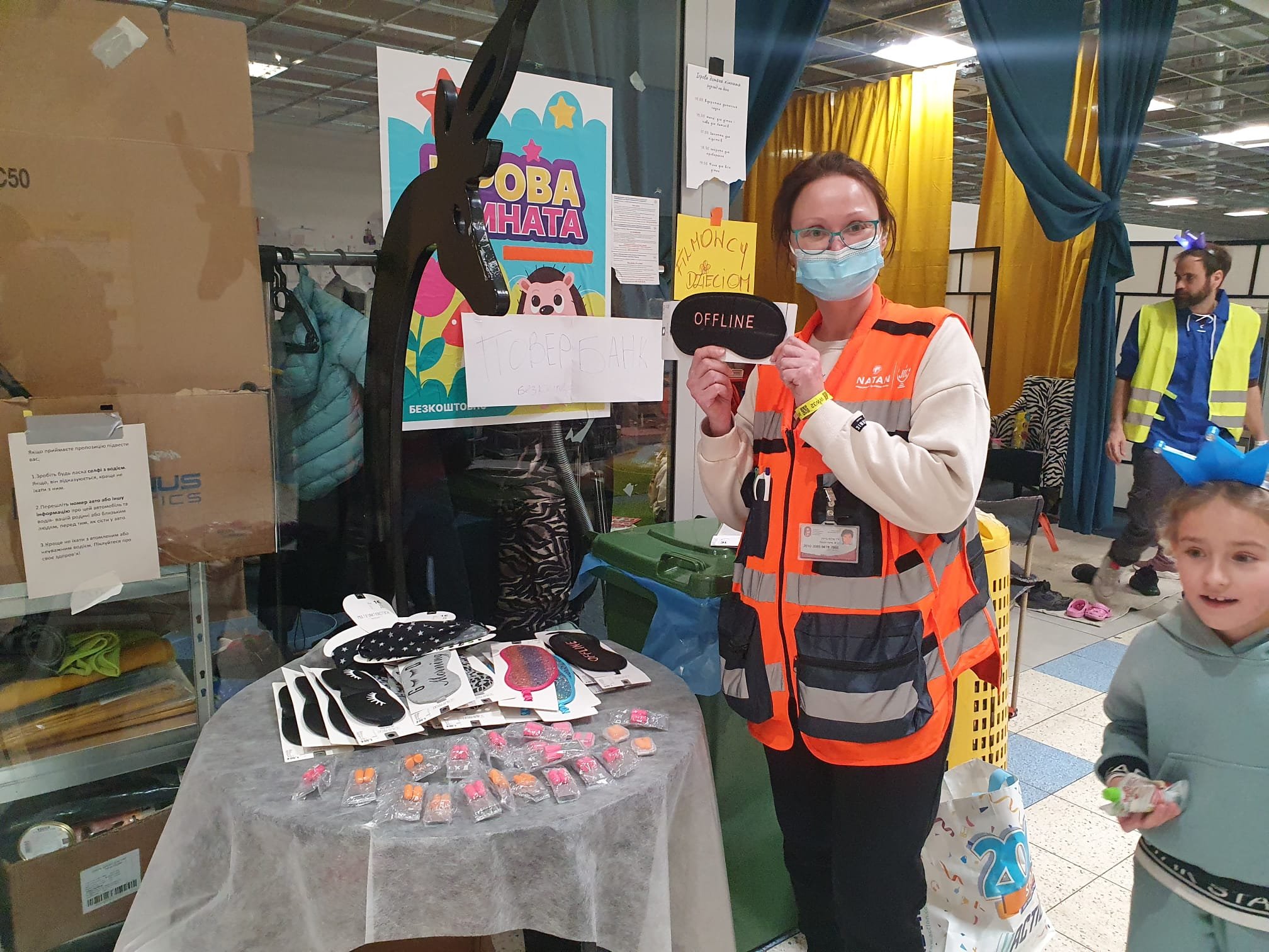 Dr Iryna Beylin with party favors at the refugee center Purim party