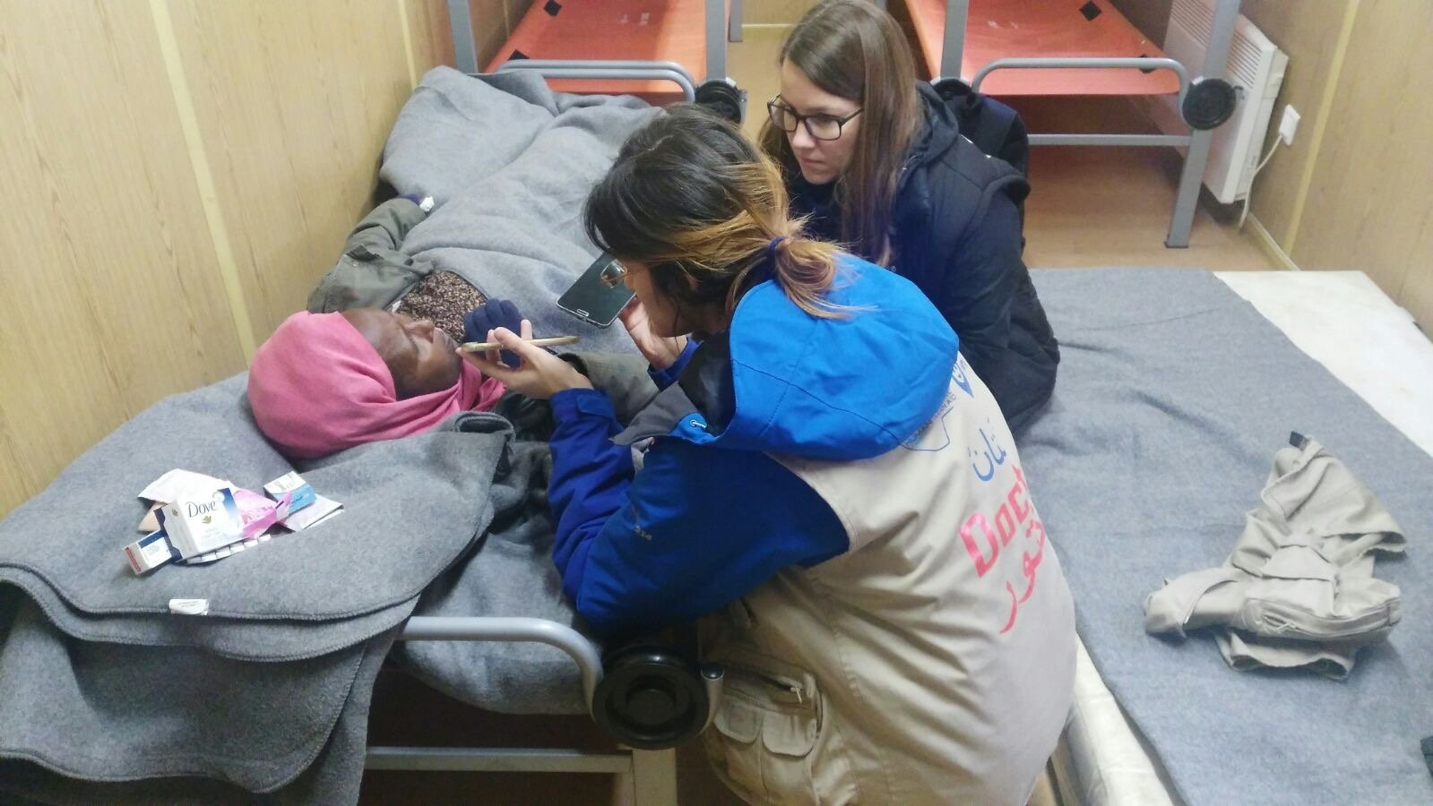 NATAN MD WITH PATIENT - REFUGEE RELIEF OPERATION, PRESEVO, SERBIA 2015