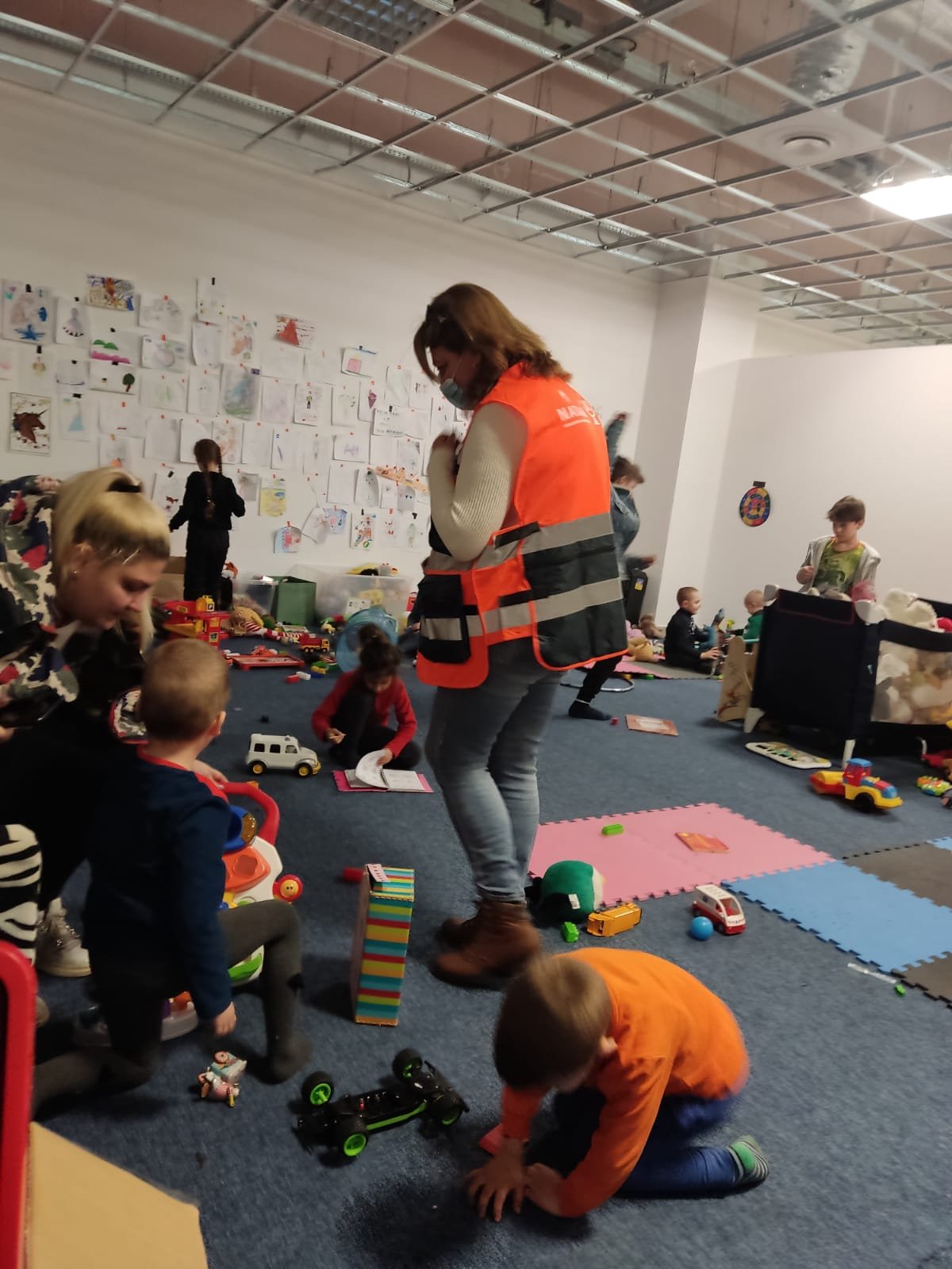 Social Worker Svetlana Buza in the children's play area at the refugee center