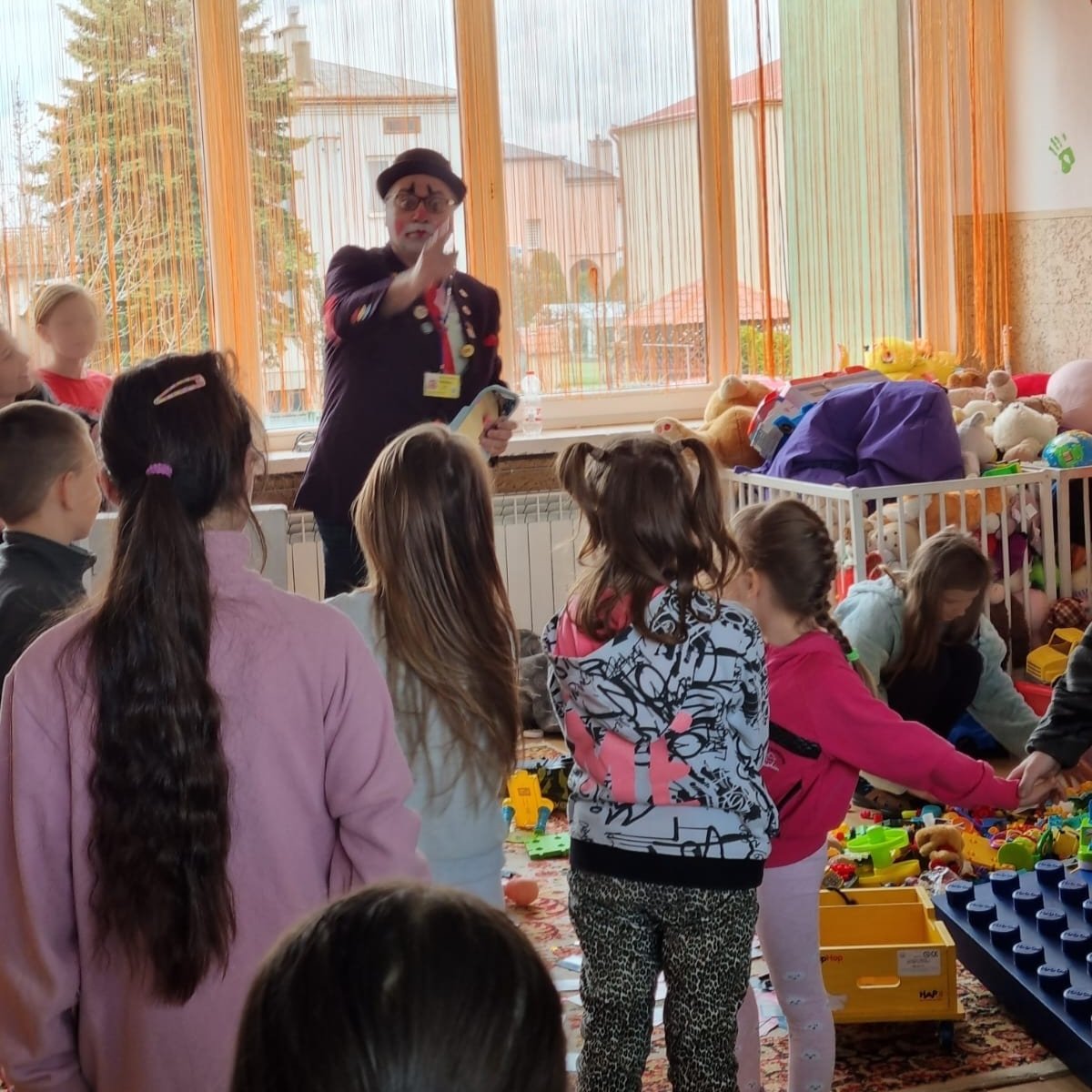 NATAN Medical Clown Michael Vernik entertains children at Przemysl Refugee Center