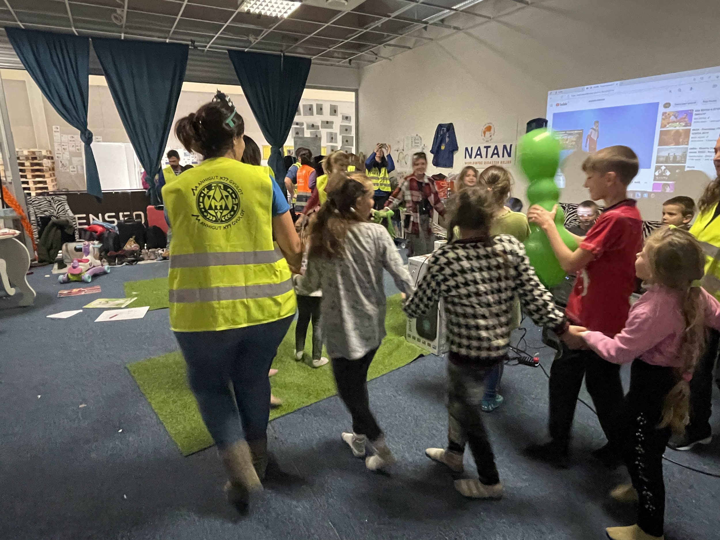 NATAN and Hashomer Hatzair volunteers lead activities in the children's playroom at the Przemysl refugee center.