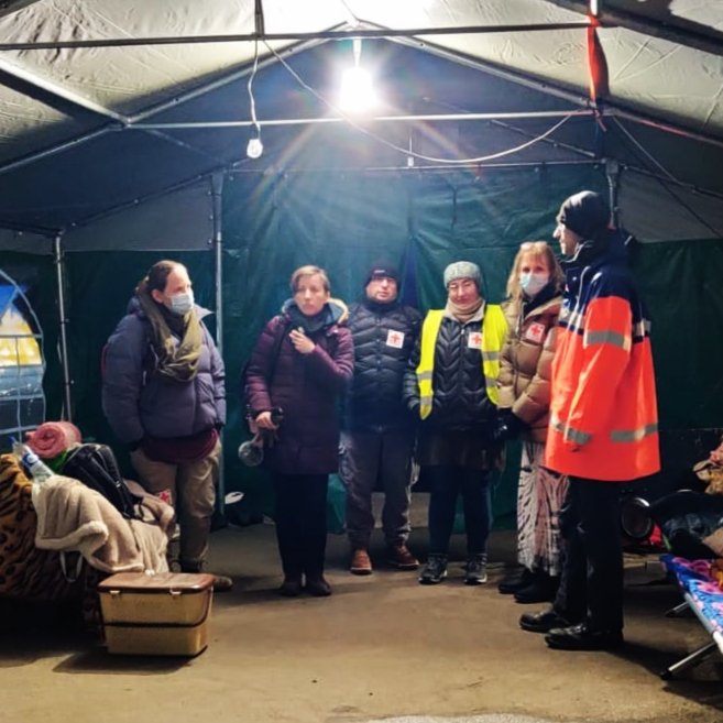 NATAN team receive briefing from local volunteers at a border crossing point