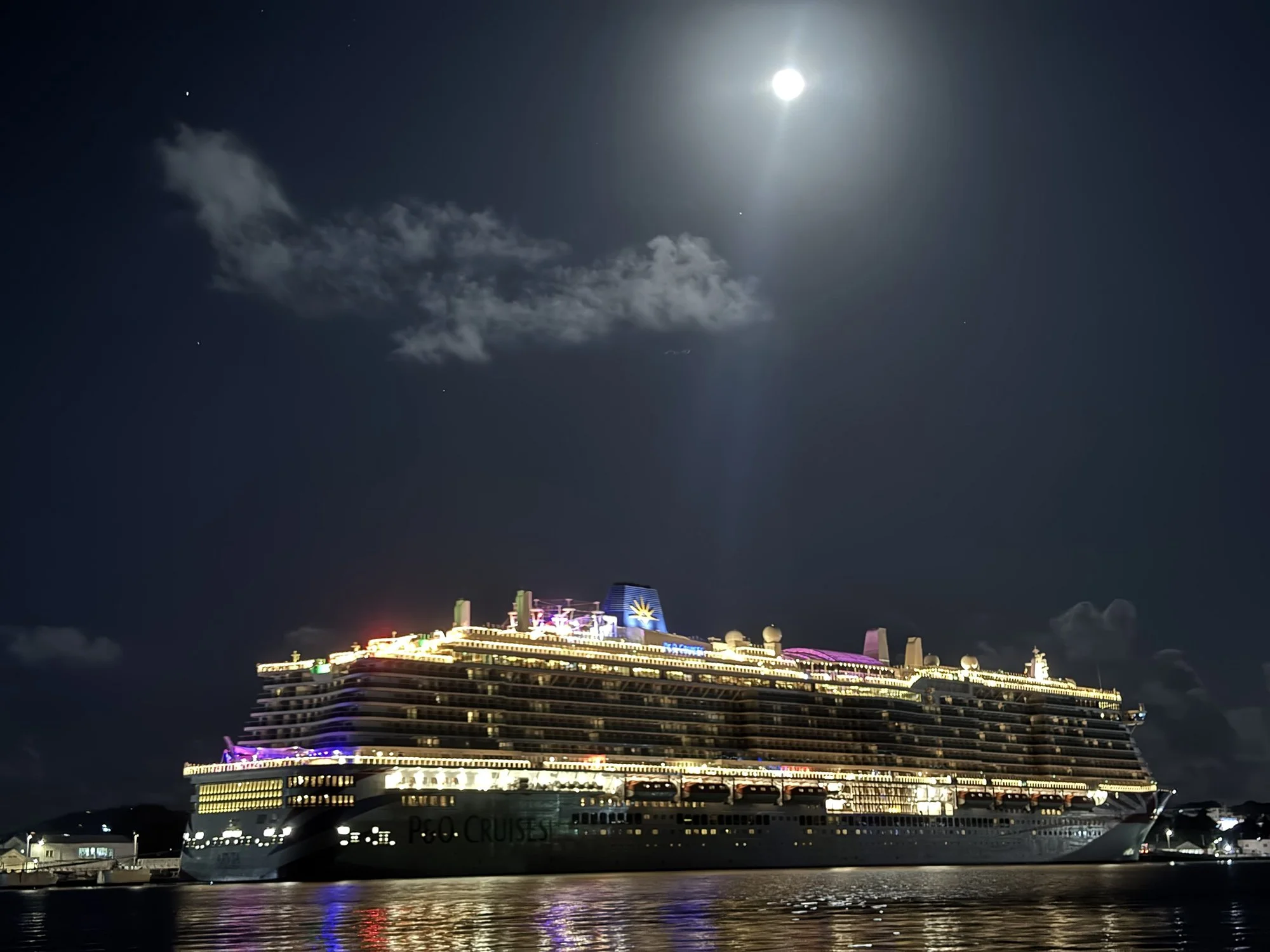 Arvia cruise ship at night in the Caribbean