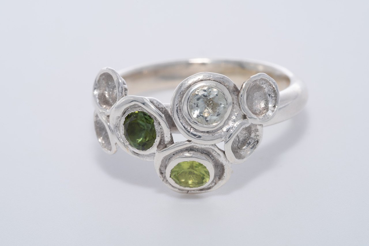 Lichen ring with tsav, peridot and cz.jpeg