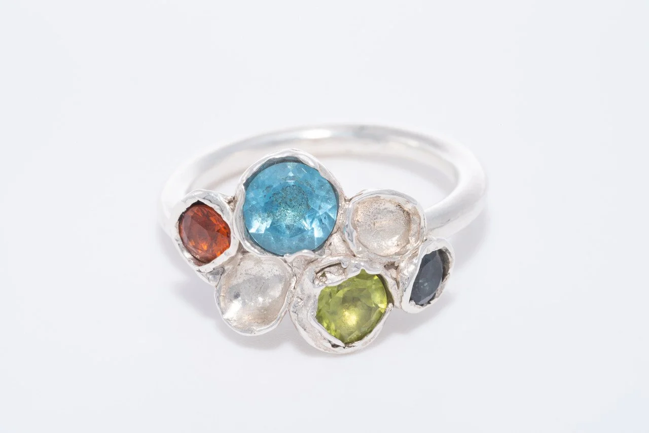 Large lichen ring orange sapphire, swiis topaz, peridot and LBt.jpeg