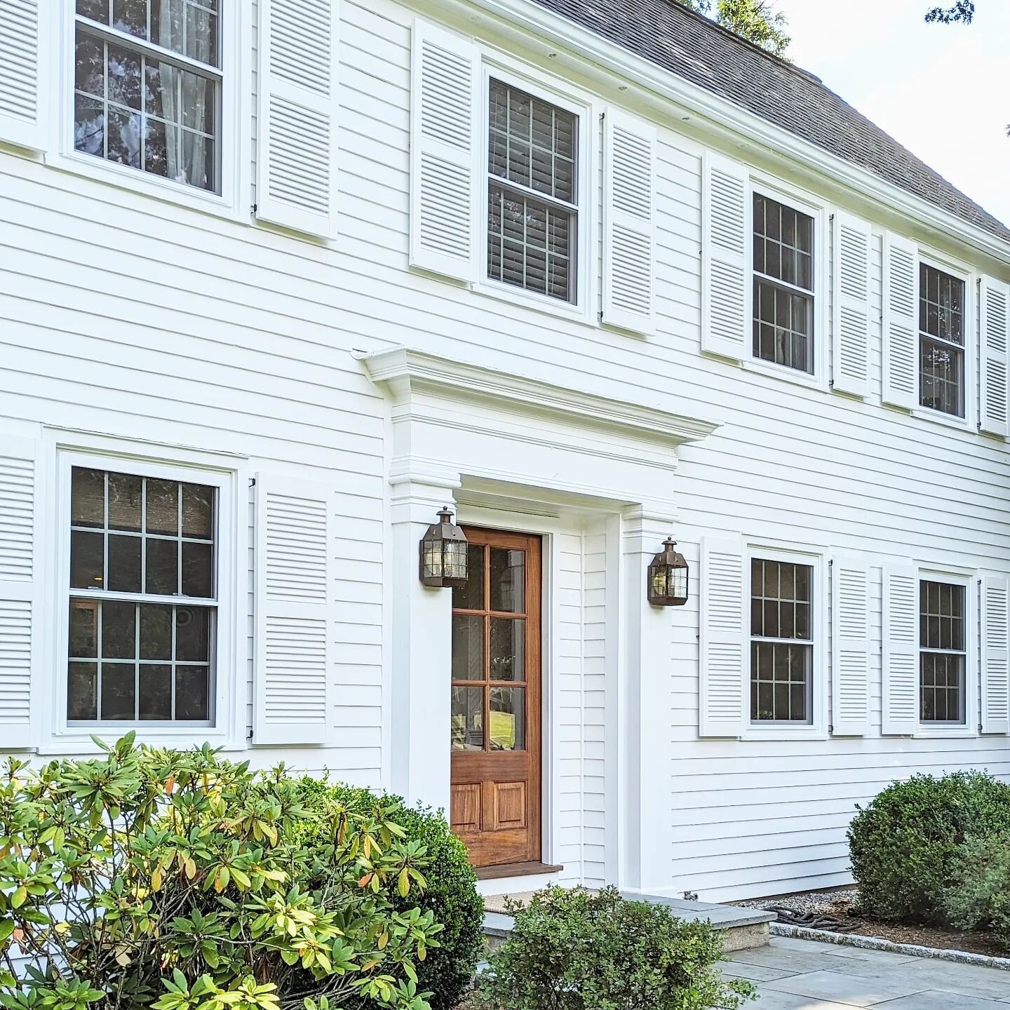 This home has seen two baby girls through childhood to young adults. With so many beautiful chapters completed it felt time to begin a new one. Formerly adorned with yellow siding and blue shutters, this creamy white on white provided the fresh take 