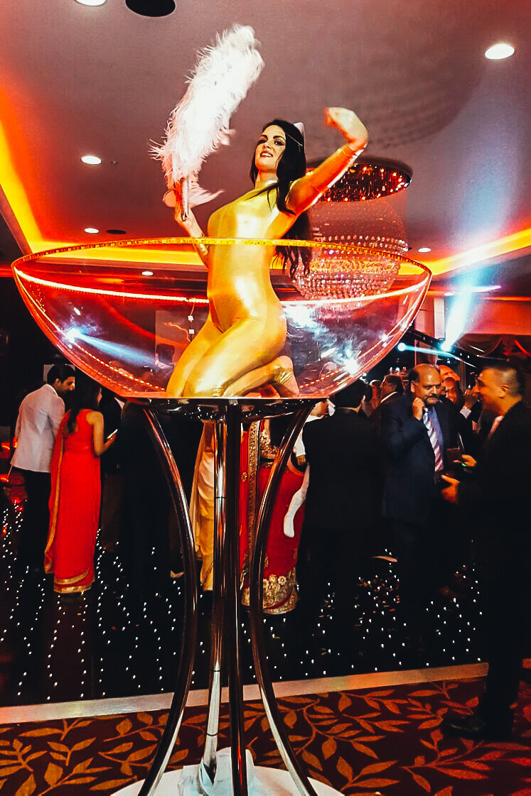 Giant Martini Glass burlesque performers