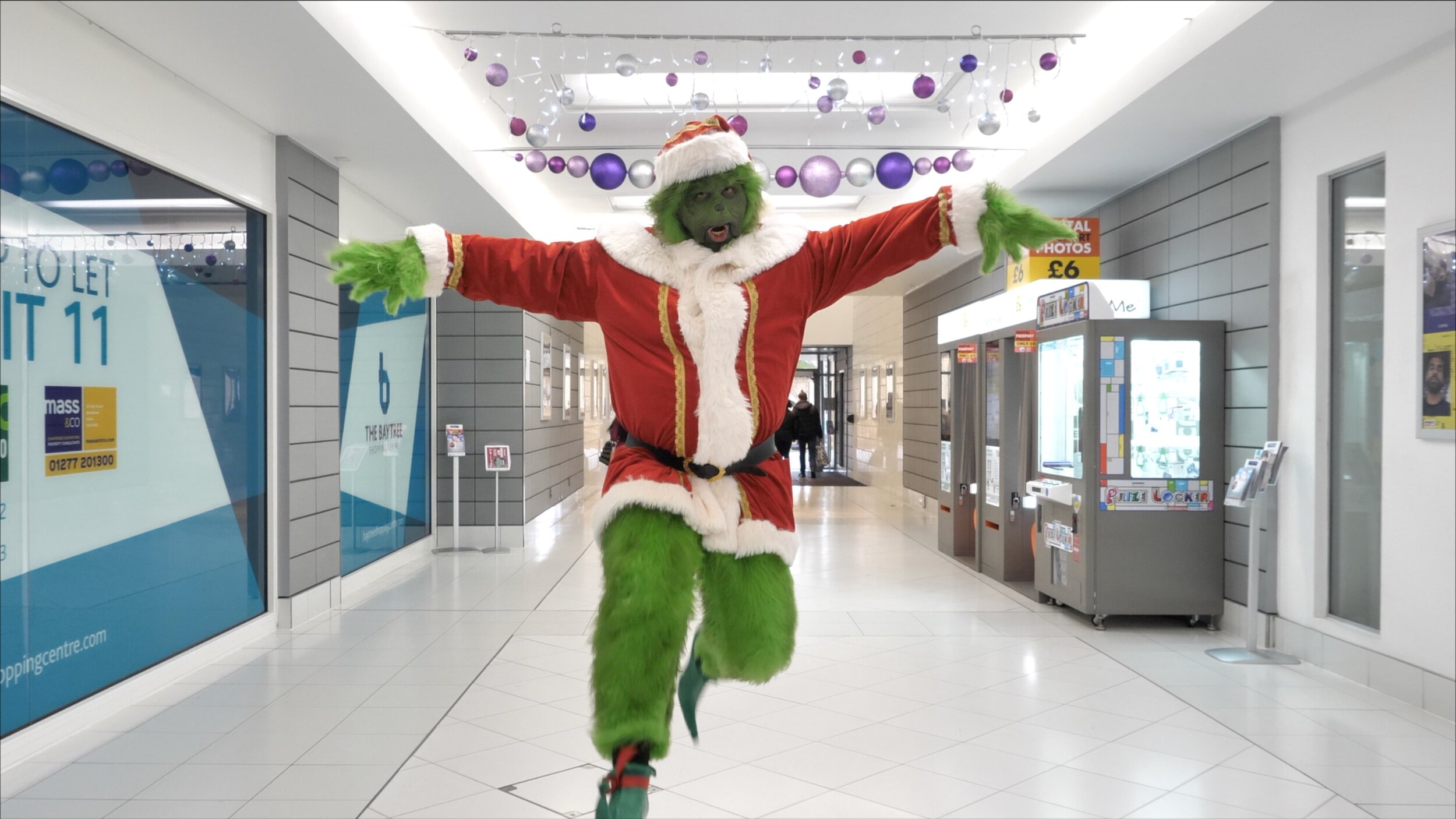 Grinch impersonator at event