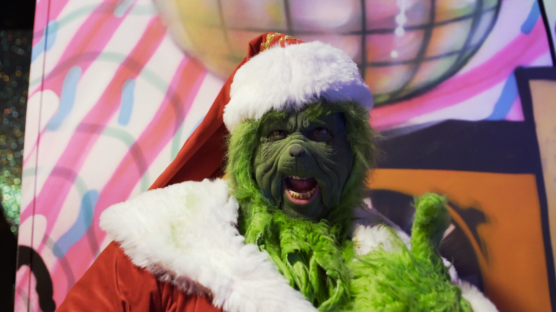 Grinch impersonator at event