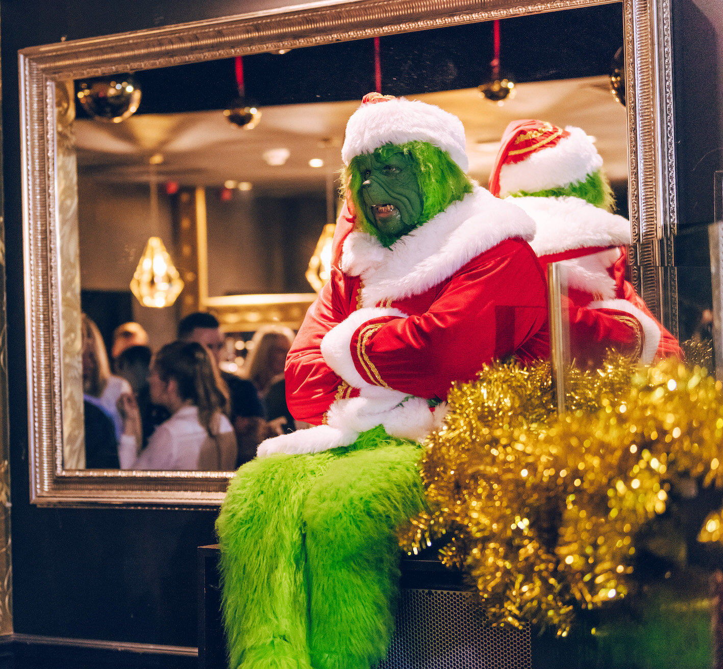 Grinch impersonator at event