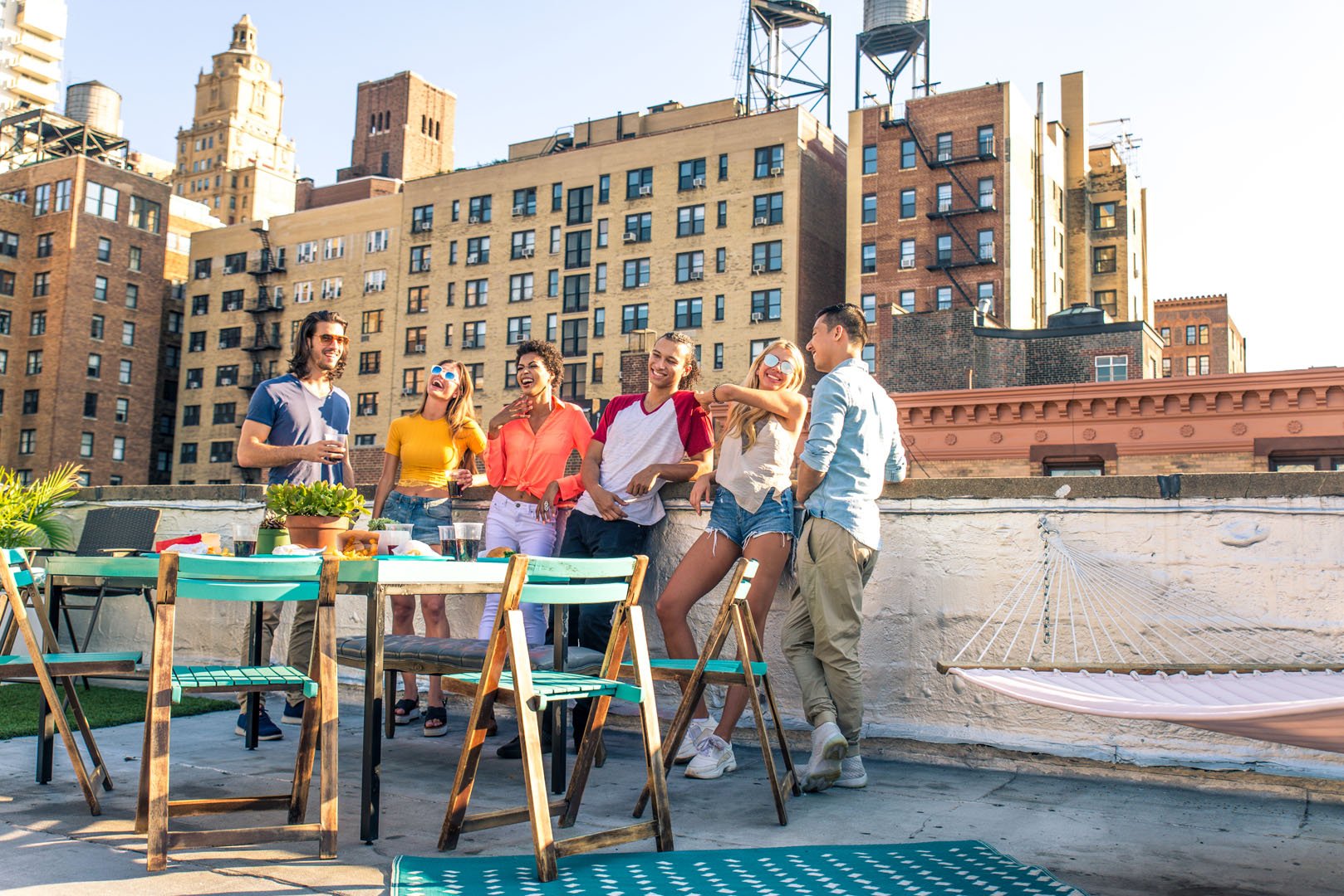group-of-friends-having-party-on-a-rooftop-2023-11-27-05-08-48-utc.jpg
