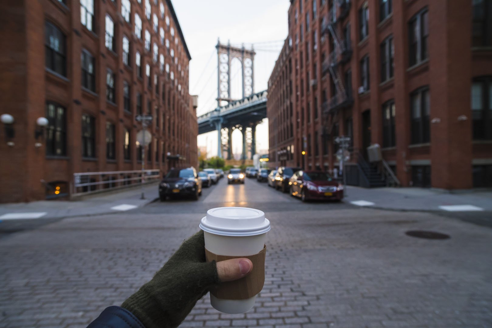 man-holding-coffee-cup-in-new-york-city-2024-12-06-22-56-03-utc.jpg