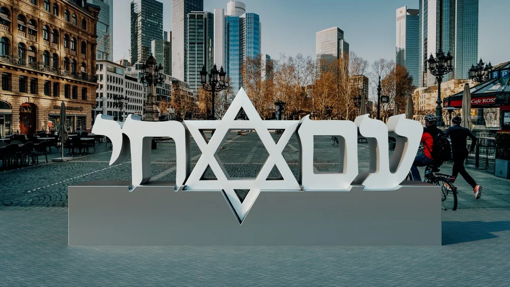 Am Yisrael Chai sculpture in an urban square