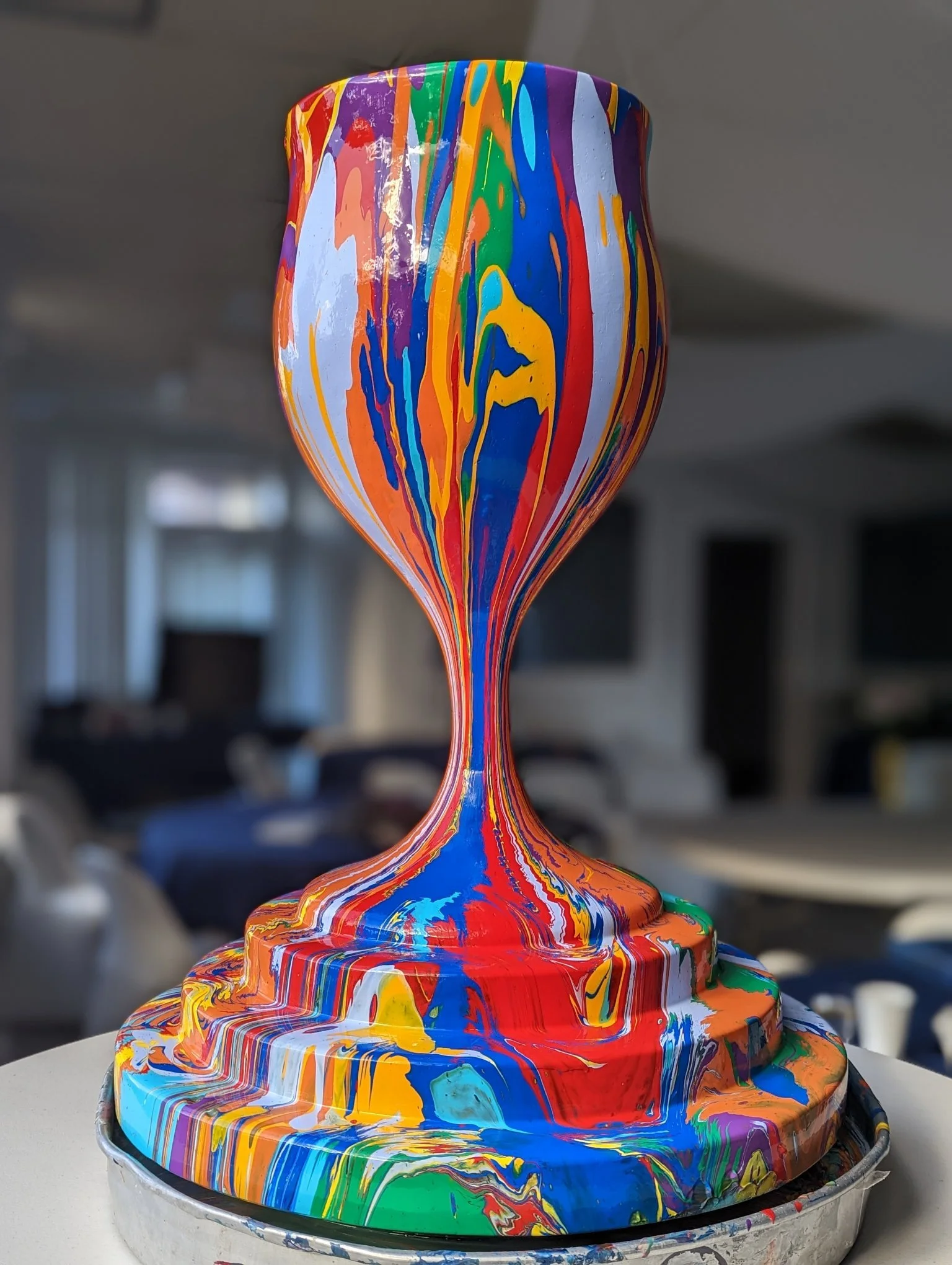 Colorful kiddush cup sculpture by Yitzchok Moully — Jewish Judaica art piece with vibrant multicolored drip design