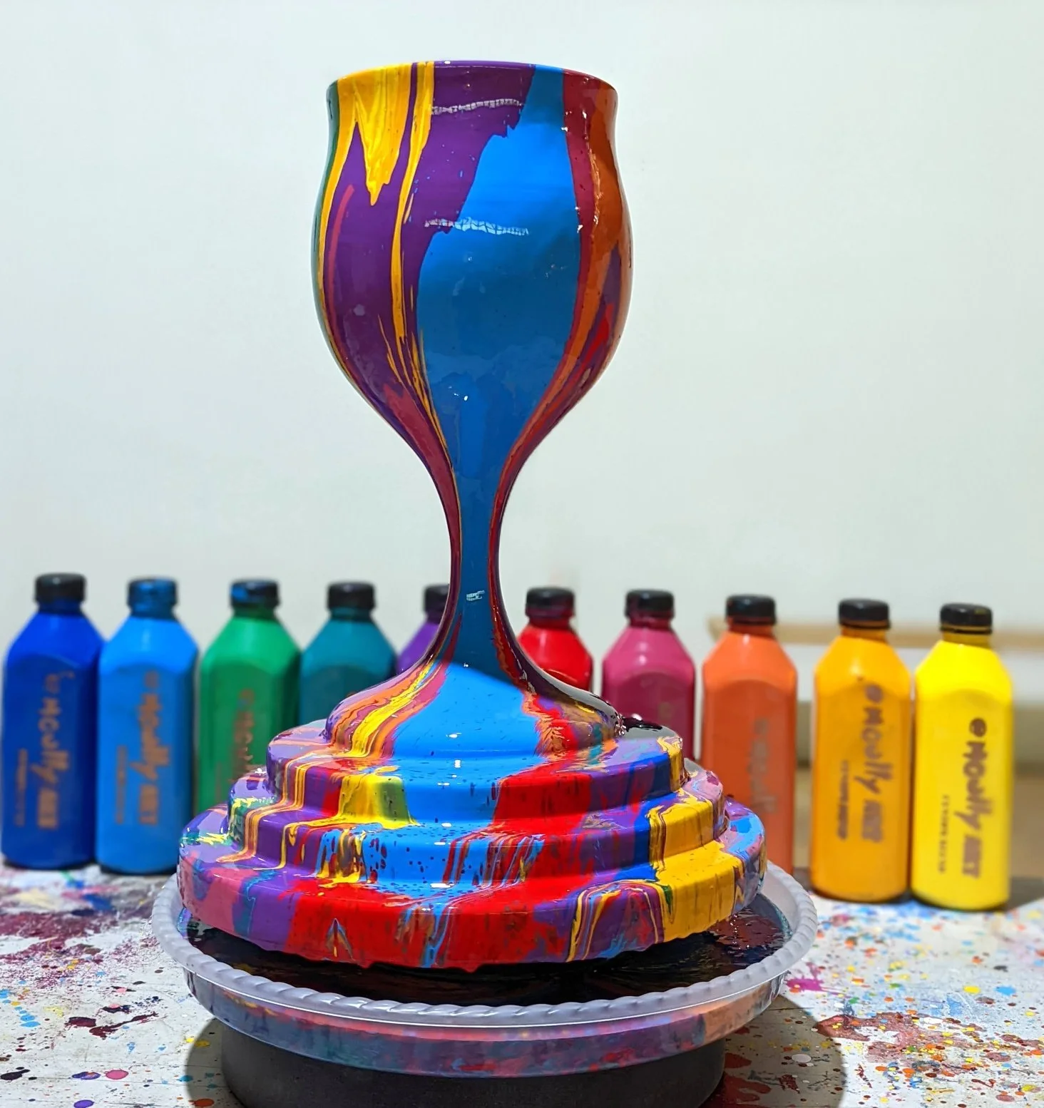 Overflowing Blessings ceramic vase with vibrant multi-color pour art by Yitzchok Moully — completed Jewish art workshop piece