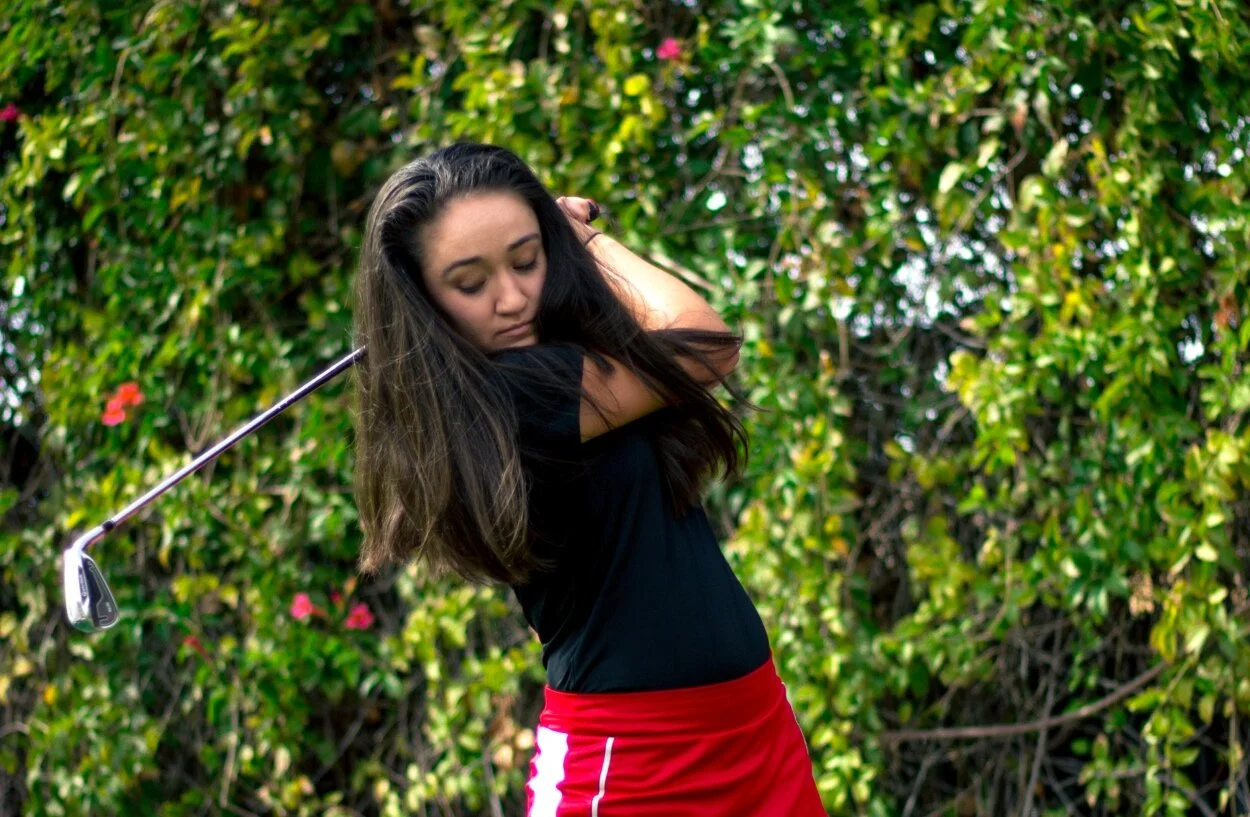 Two under par: Siblings drive each other’s golf game