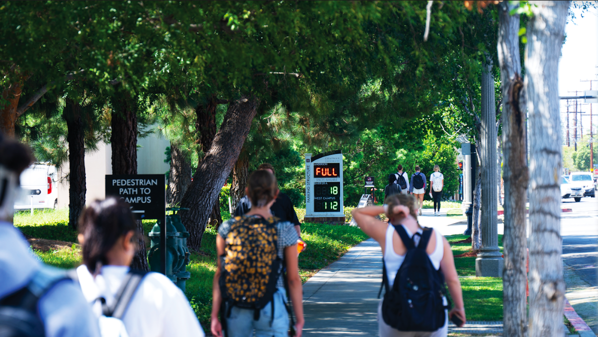 Students face crowded parking and housing issues across campus as enrollment reaches all-time high