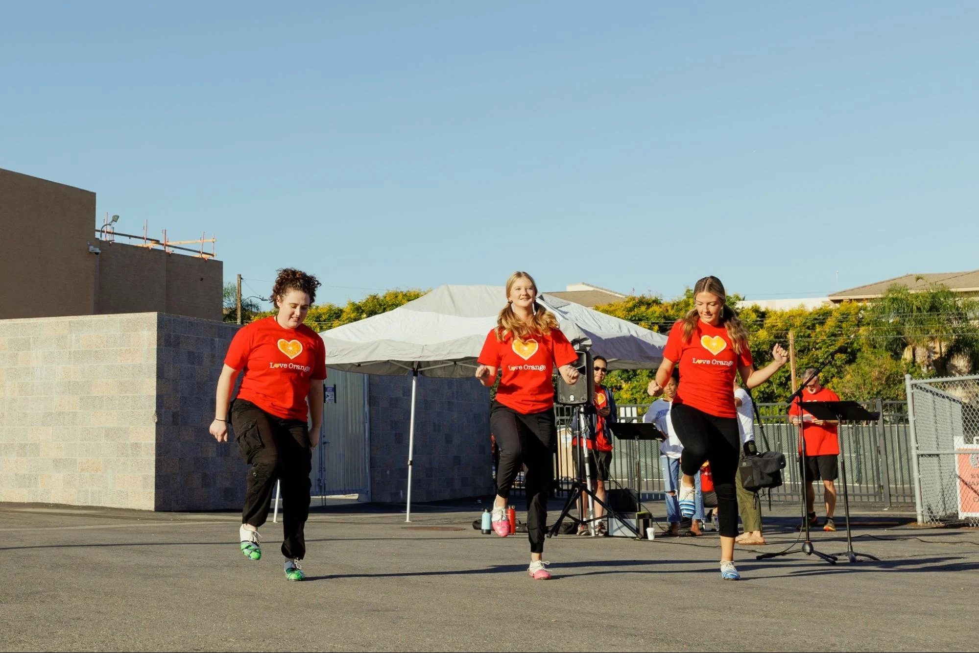   Percussive dancers, (left to right) Felicity Zachry, Elizabeth Crawford and Natalie Carter, perform their energetic dance set.  