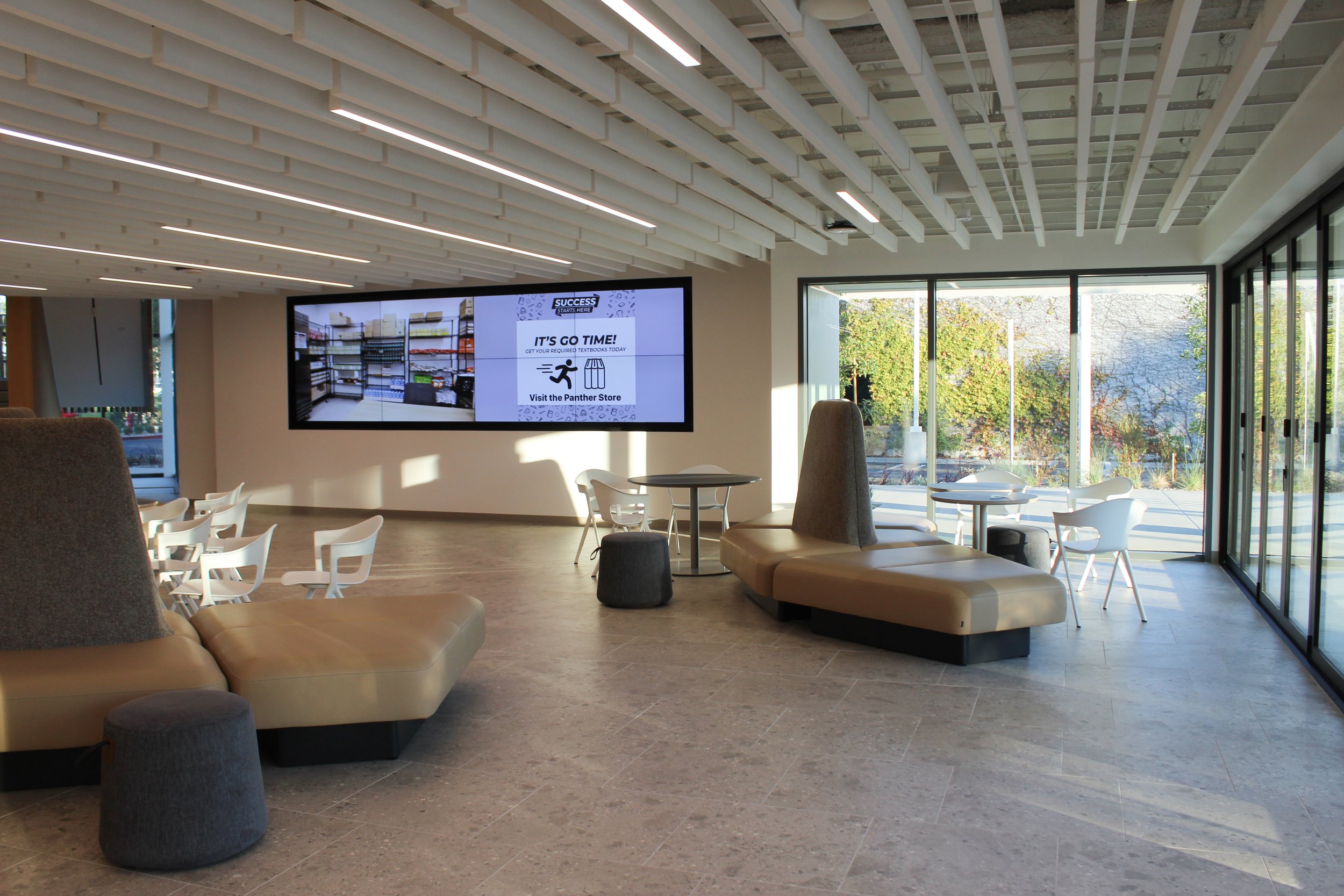 Aside from a new on-campus dining establishment and a new store, the new center also features a series of couches and several student workrooms where students can also check out laptops or use wireless charging packs, among other amenities.