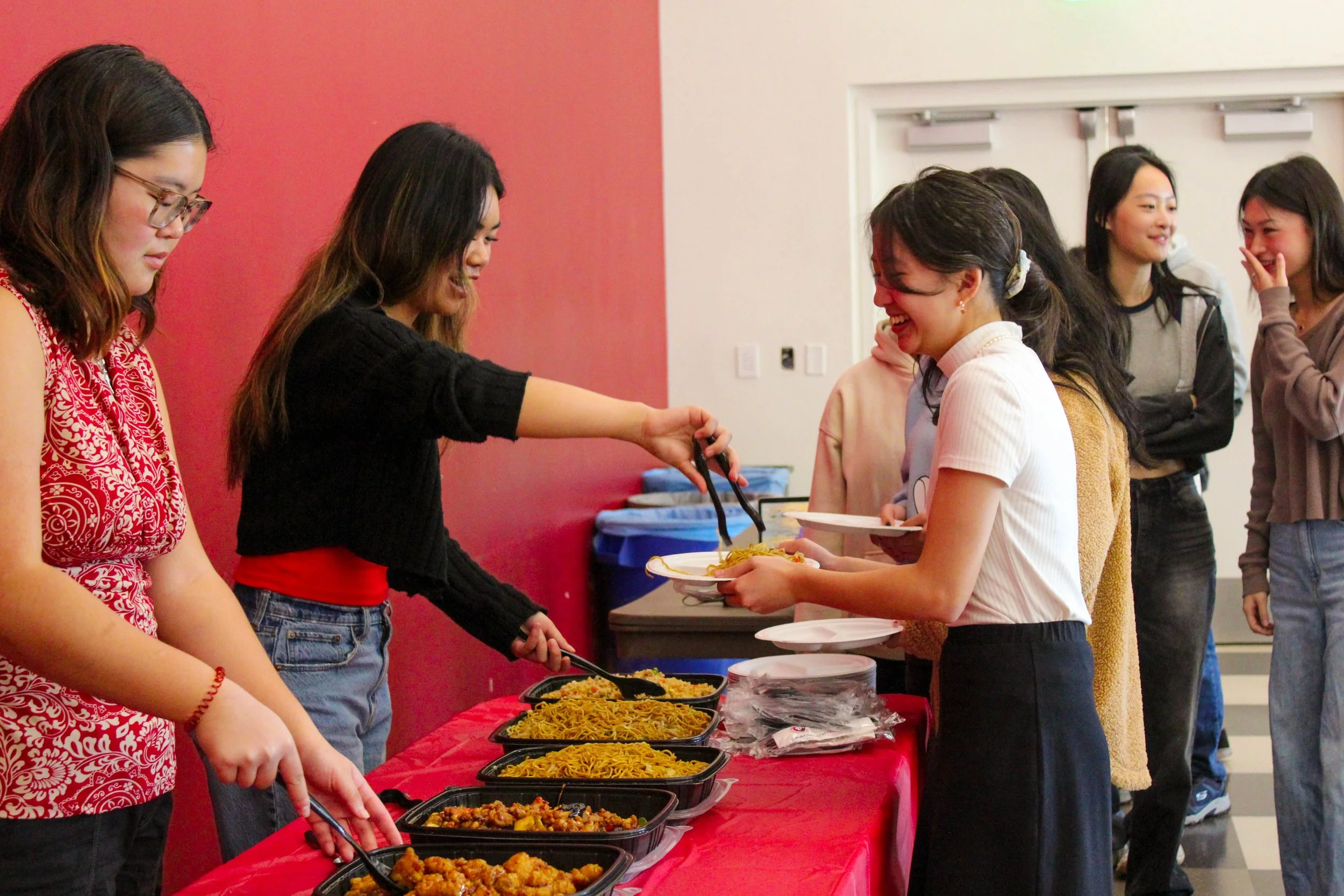    Students wearing red, gold or dragon-themed items got priority in line.   