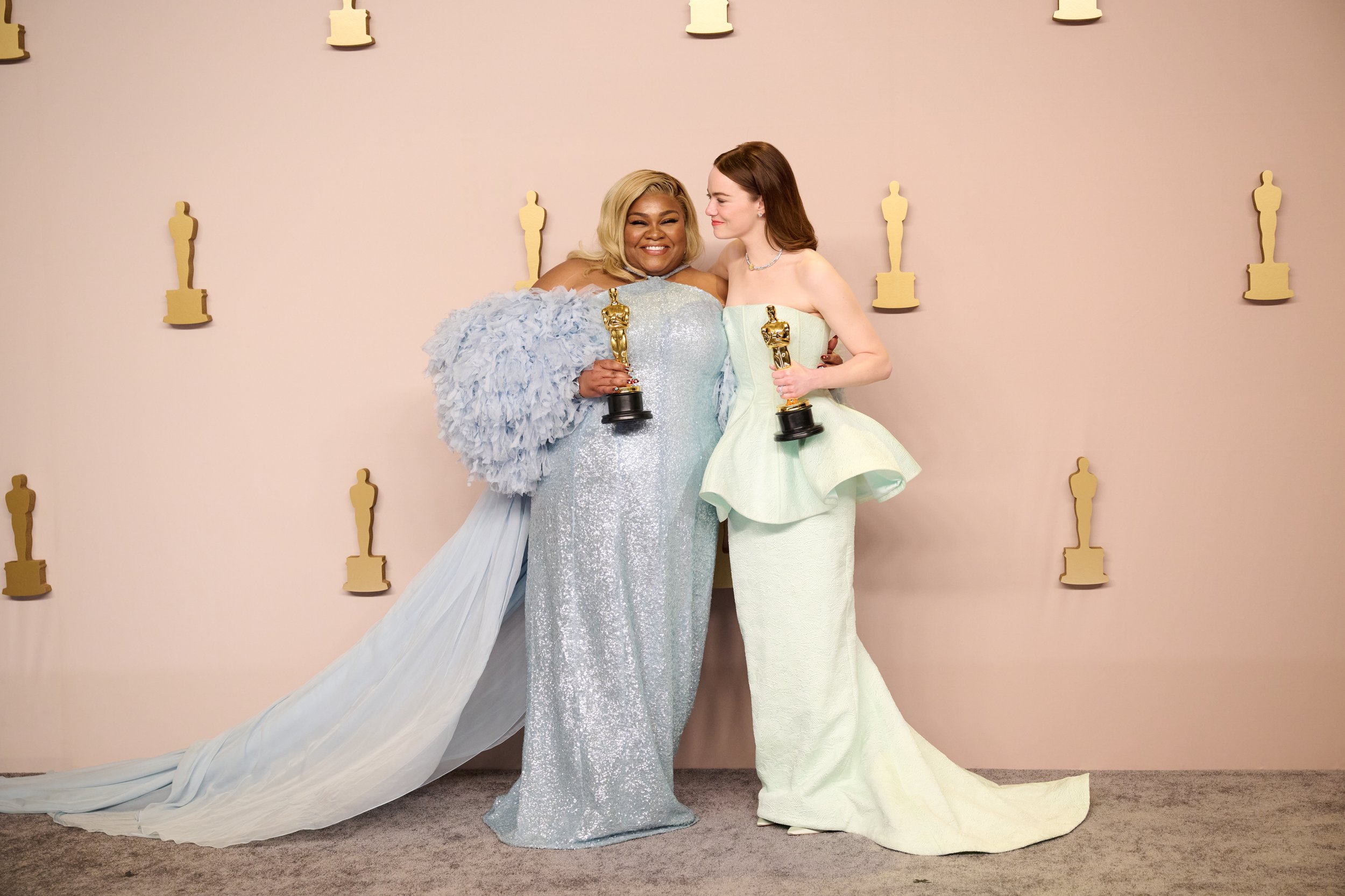   Da’Vine Joy Randolph (left) of “The Holdovers” and Emma Stone of “Poor Things” pose backstage with the Oscar for Best Actress in a Supporting Role and Best Actress in a Leading Role, respectively, during the live ABC telecast of the 96th Oscars at 