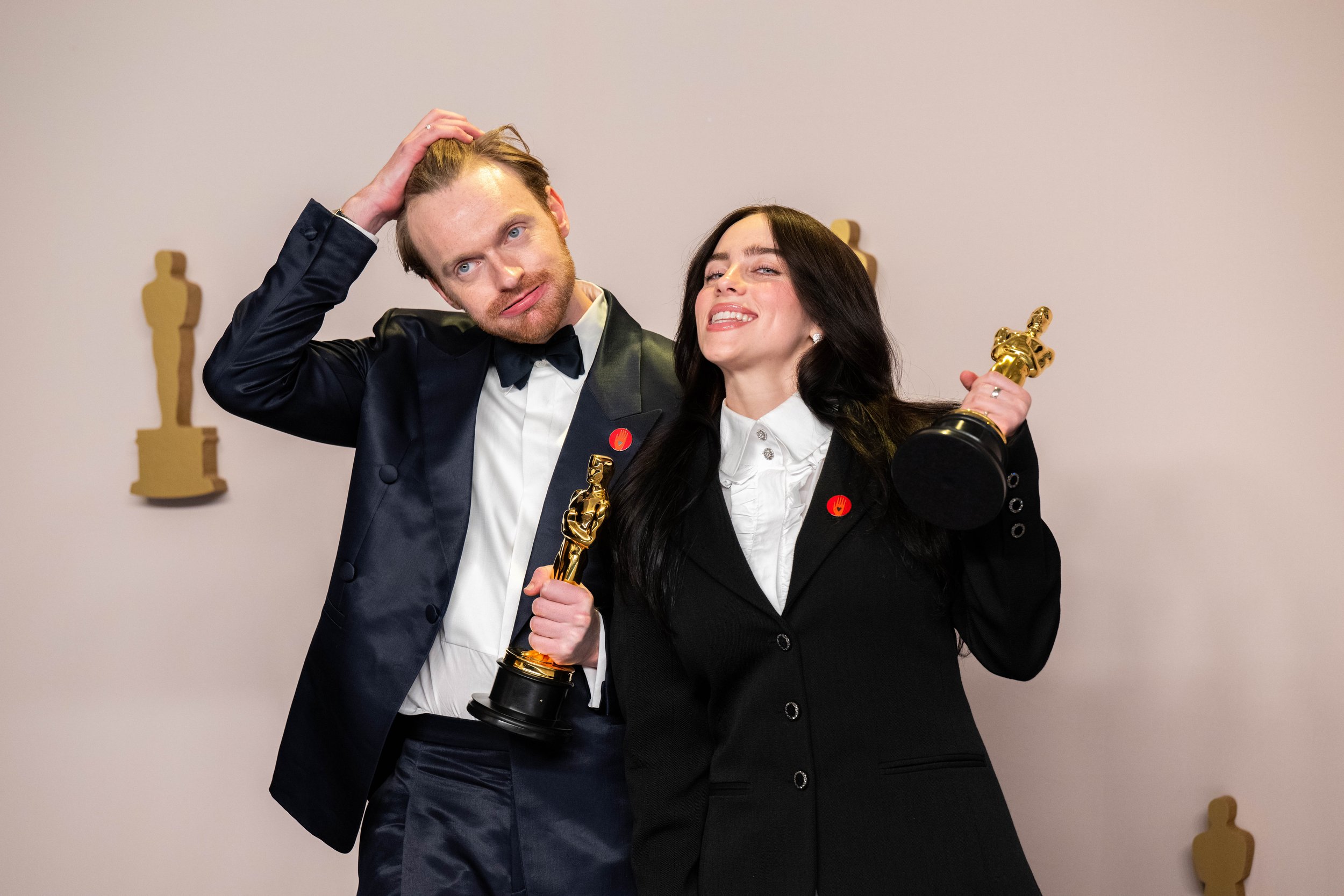   Singer-songwriting duo Finneas O’Connell and Billie Eilish pose backstage with the Oscar for Best Original Song during the live ABC telecast of the 96th Oscars at Dolby Theatre at Ovation Hollywood on Sunday, March 10, 2024.  