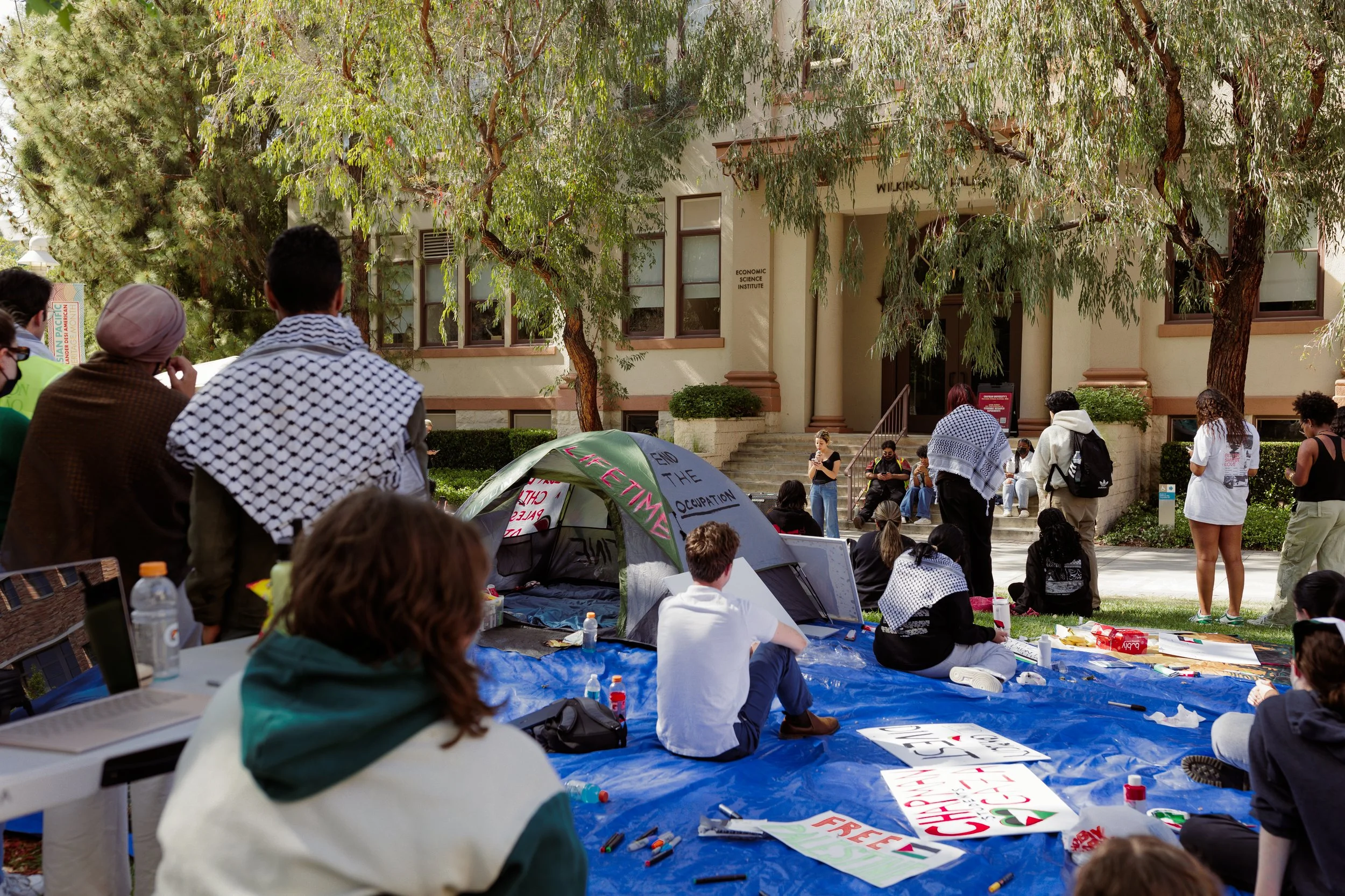    Attendees at the encampment later in the afternoon on May 2. Photos by EMILY PARIS, Photo Editor   