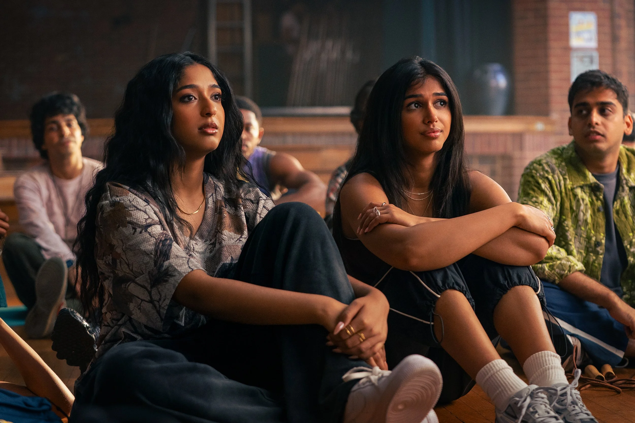 Maya (Maitreyi Ramakrishnan) and Anjali (Priyanka Kedia) sitting in Best of the Best