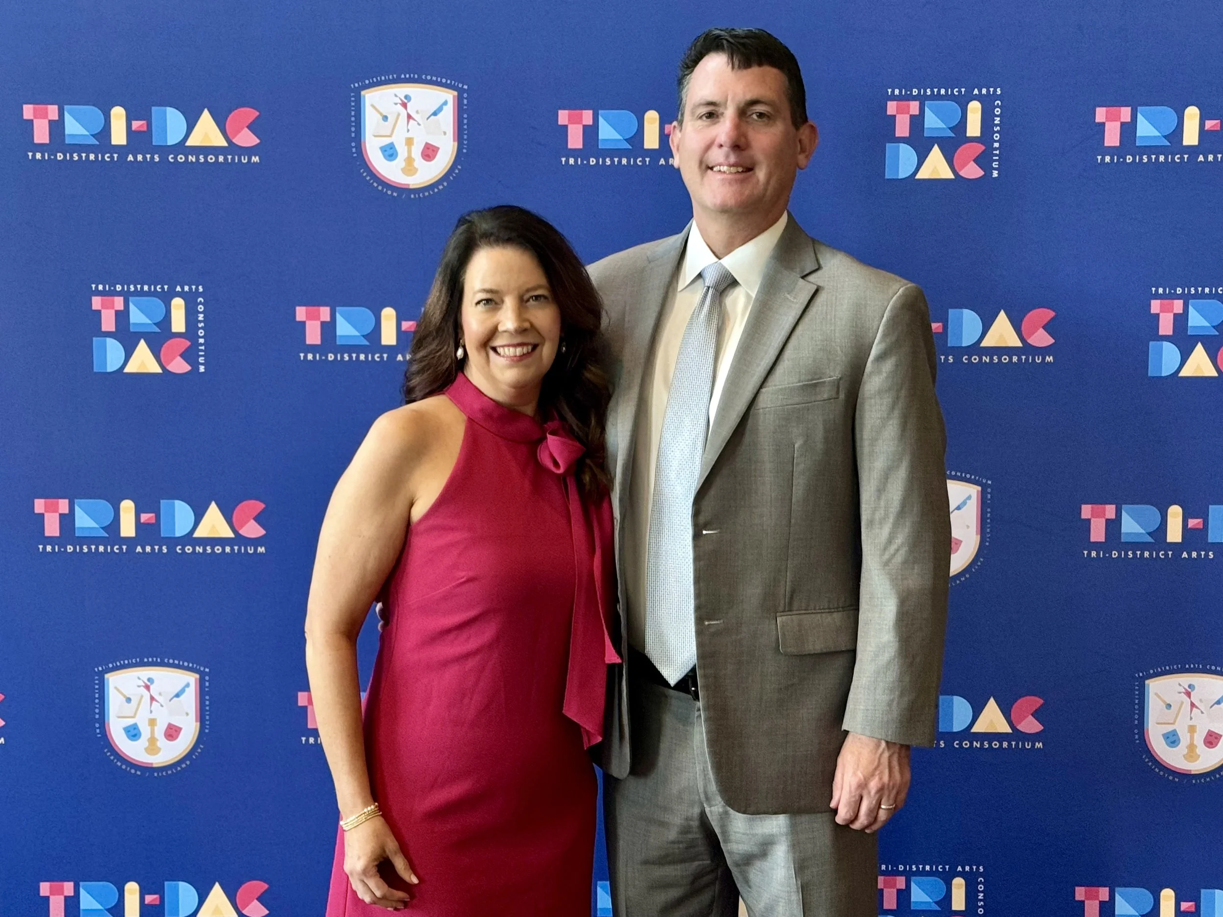 Former Lexington One Tri-DAC Coordinator, Erin FitzGerald and husband.