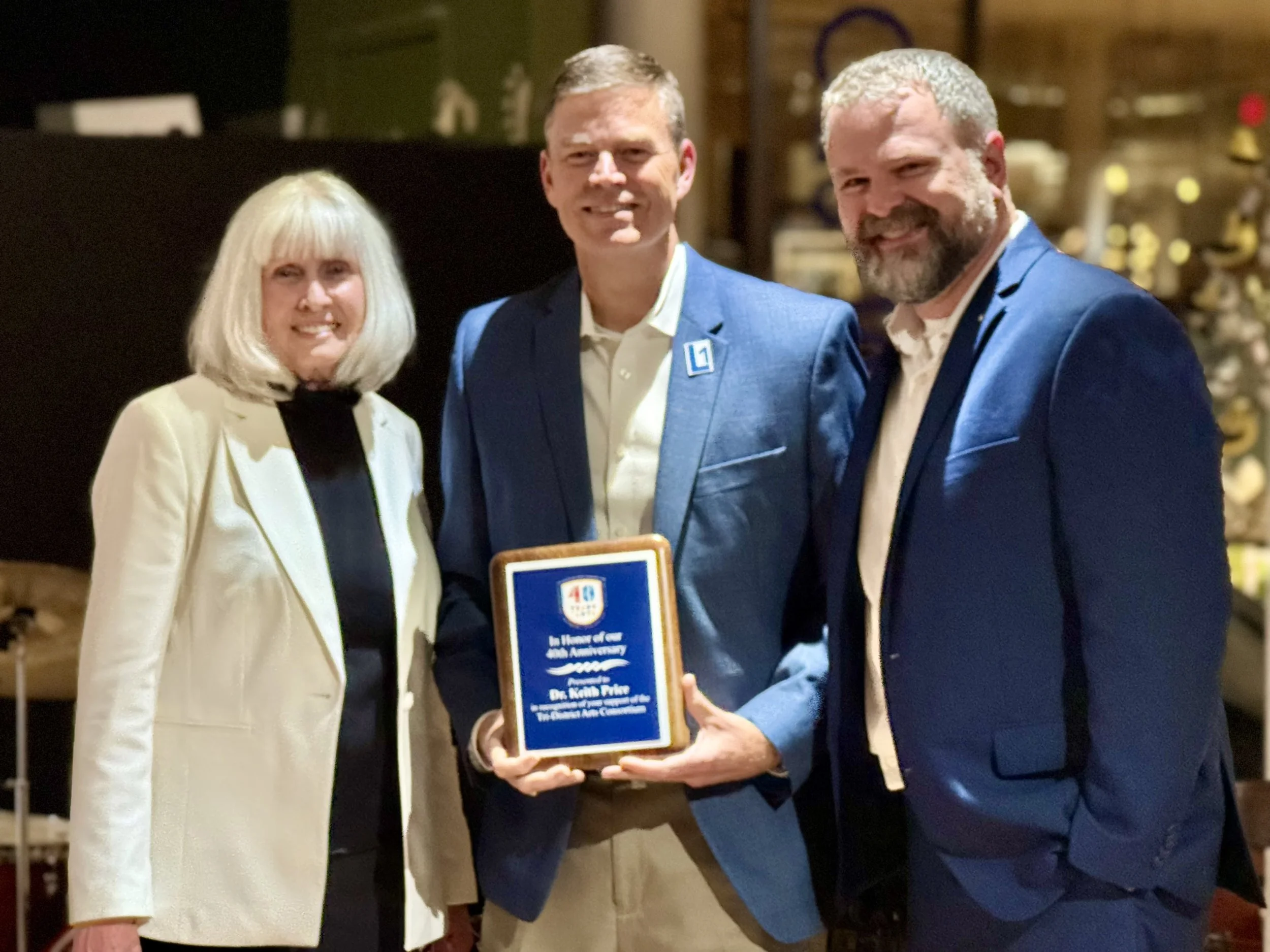 Lexington One's Superintendent, Dr. Keith Price, receiving the 40th Tri-DAC Anniversary award in honor of  his support of Tri-DAC.