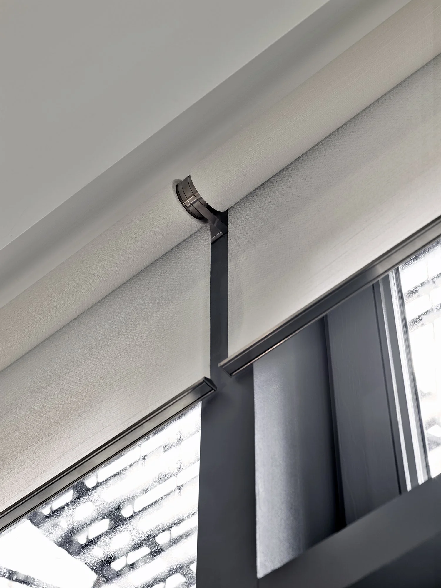 Lutron Palladiom Motorized Shades with Exposed Hand Finished Brackets | VIP Smart Homes Seattle Bellevue