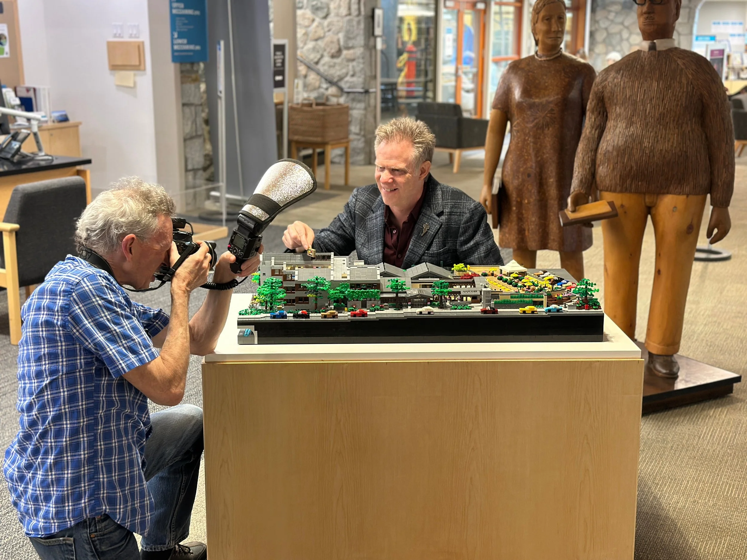September 2025 – The North Shore News photographed Paul Hetherington at the West Vancouver Memorial Library for an article featuring his commissioned LEGO installation created for the library.