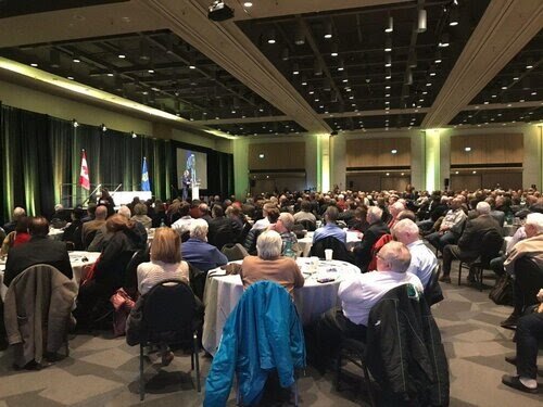 Attendees listen to Ted Morton speak at “The Value of Alberta” conference.