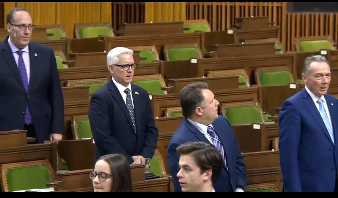 The photo was taken earlier this week in Parliament, during the singing of Canada's national anthem.