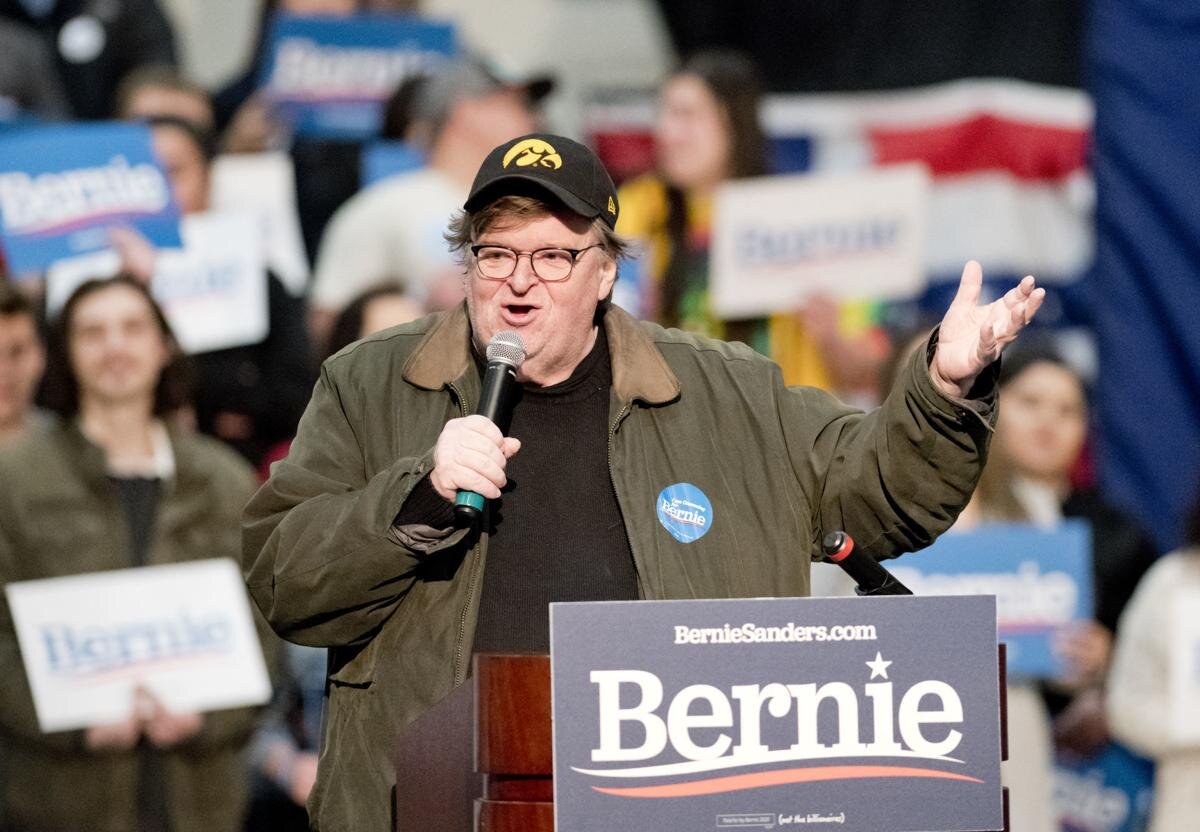 Michael Moore speaking at a Bernie Sanders presidential campaign rally.