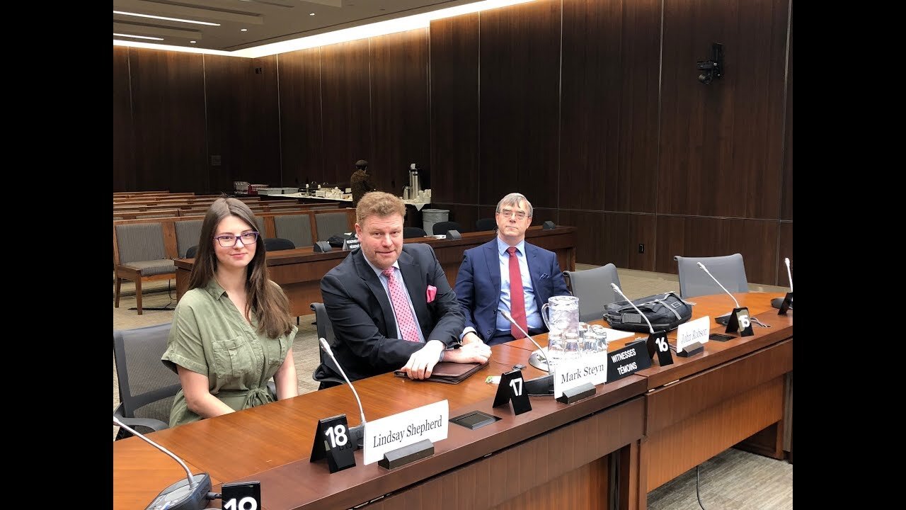 Shepherd at the parliamentary hearing, sitting next to Mark Steyn (middle), and John Robson (right)             (Photo from True North)