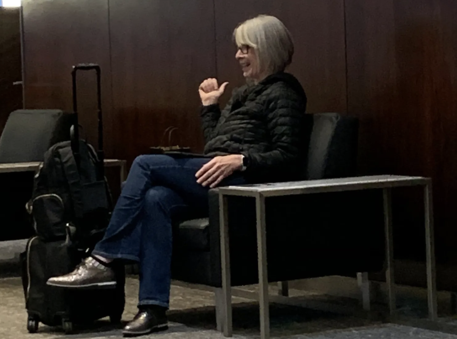 Liberal Health Minister Patty Hajdu sitting at an airport lounge not wearing a mask.