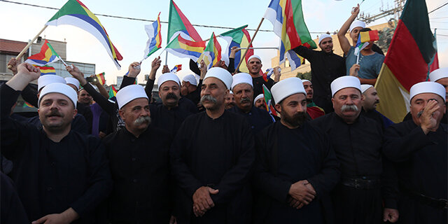 Members of the Druze religion.