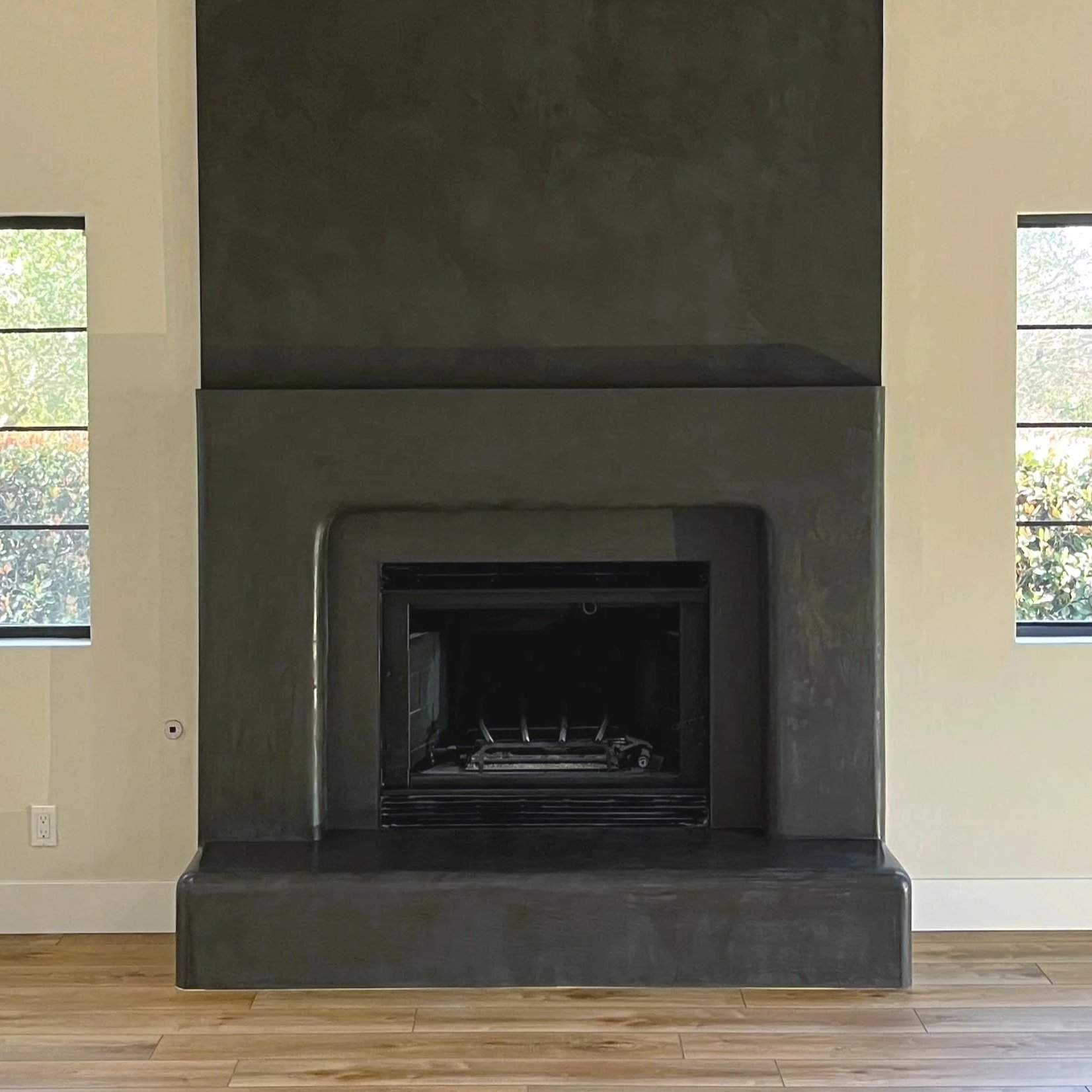 black plastered fireplace