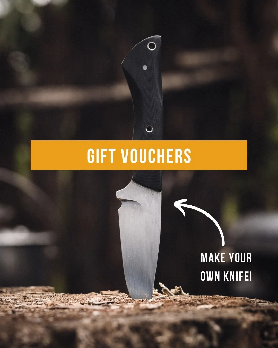 A black-handled hunting knife stabbed into a piece of wood outdoors with the text 'Gift Vouchers' and 'Make your own knife!' overlaid.