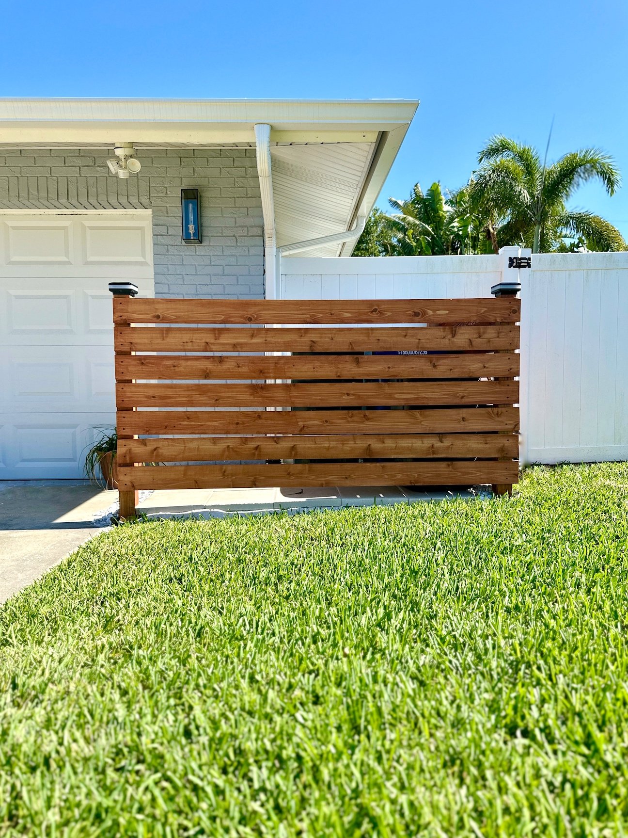 HOW TO BUILD A TRASH CAN SCREEN OUT OF FENCE BOARDS