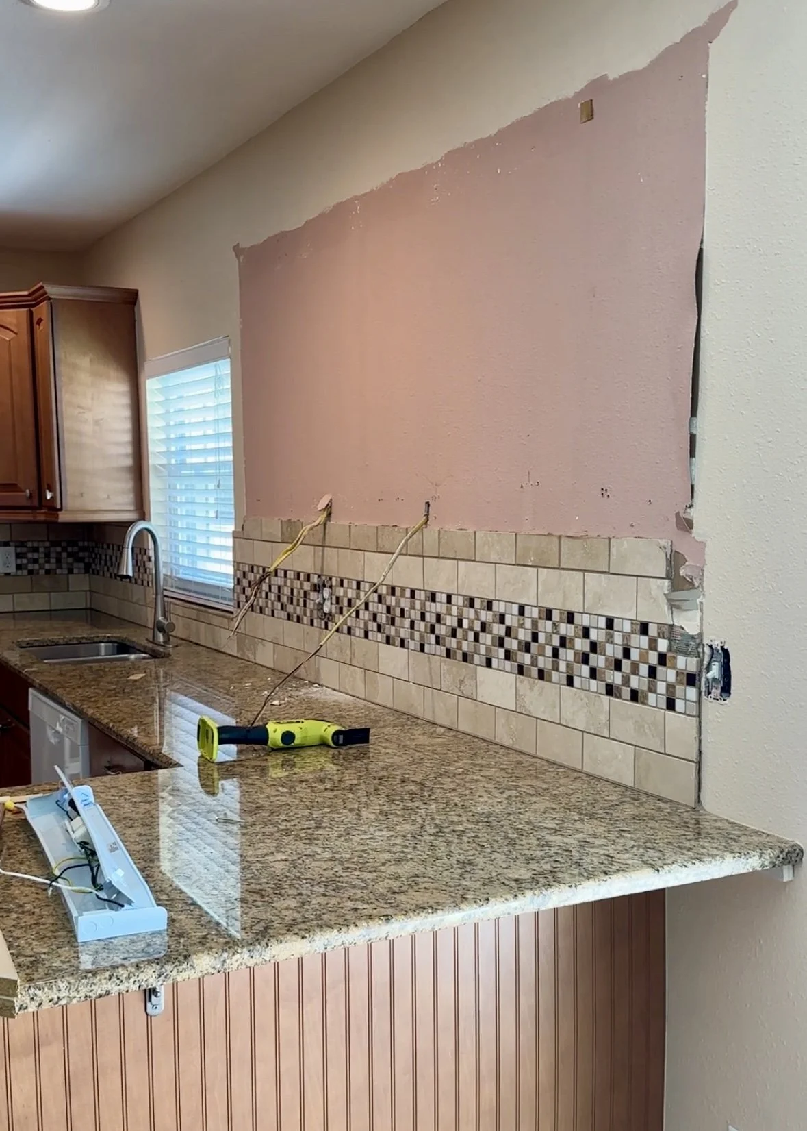 wall after uppers removed.jpeg