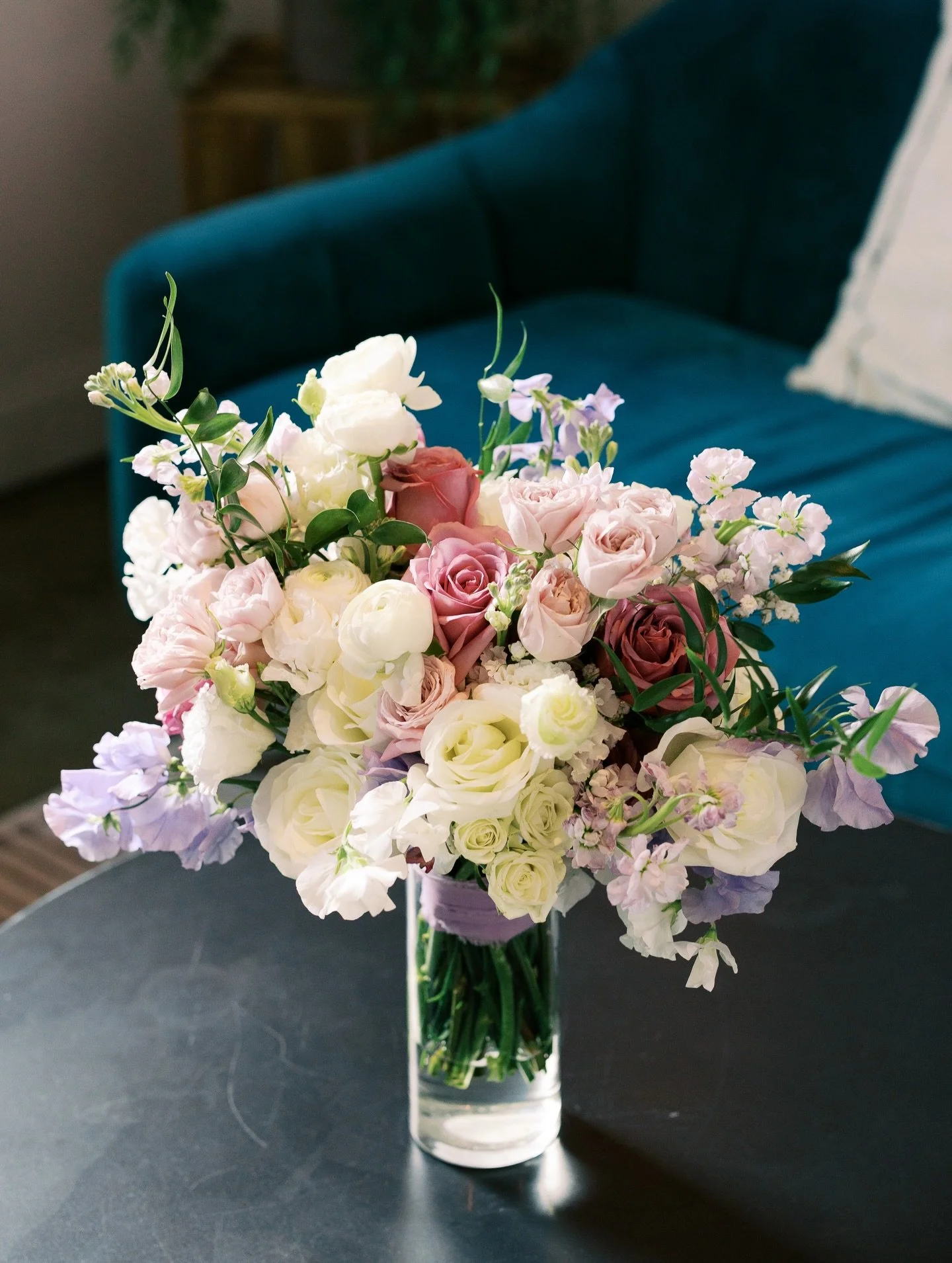 Soft lavender, blush, and creamy whites came together for the dreamiest spring palette for Tiffany&rsquo;s wedding at The Colony House. We designed her bouquet and bridesmaids&rsquo; florals to feel light, romantic, and garden-inspired while still ke