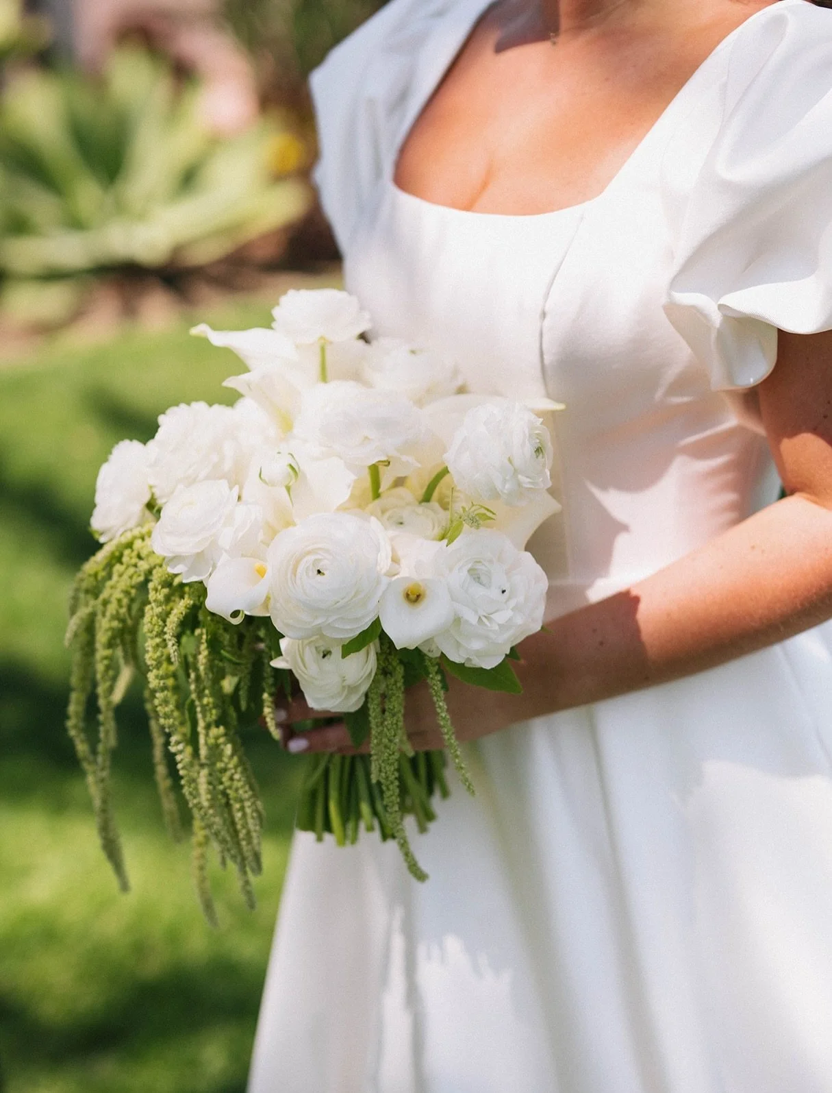 Soft whites, movement, and just enough texture to make it feel alive.

Ethan + Summer&rsquo;s personal flowers were designed to feel effortless but intentional&mdash;clean, classic, and a little undone in the best way.

From the sculptural calla bout