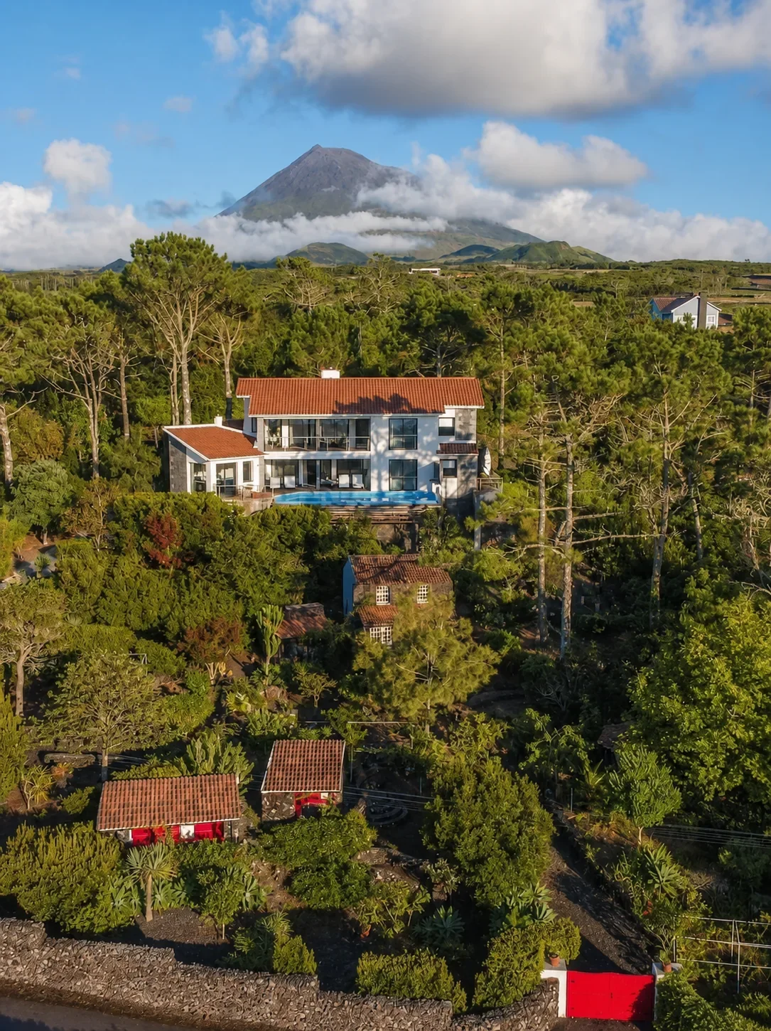 Aerial view of a rural Pico Island landscape beneath Mount Pico