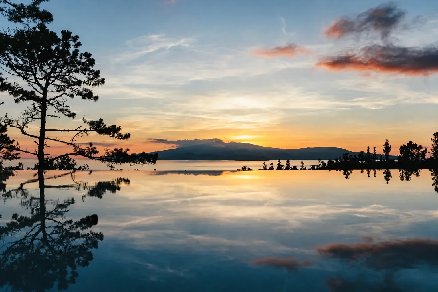 Atlantic sunset reflected across water on Pico Island
